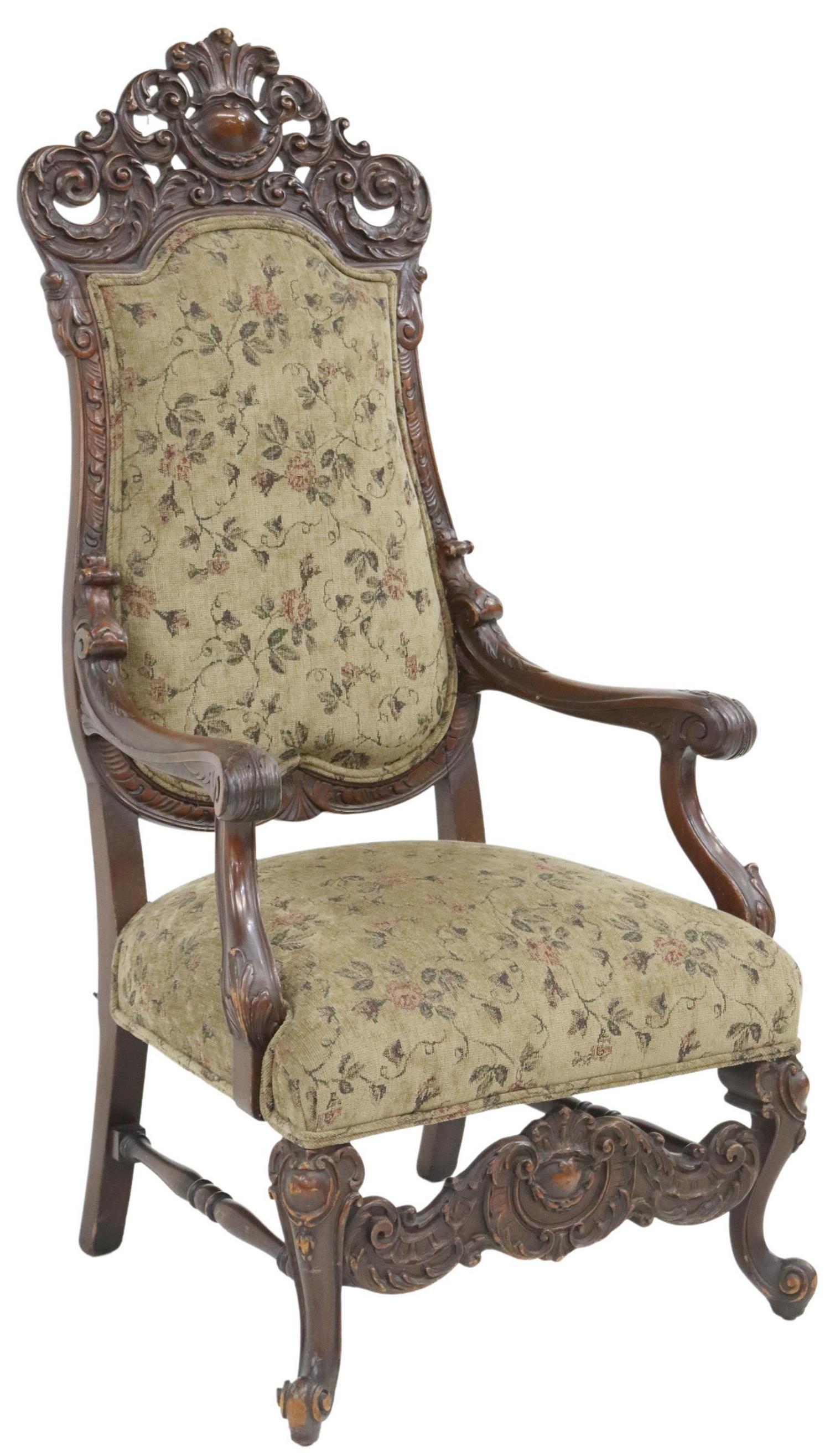 BAROQUE STYLE UPHOLSTERED ARMCHAIR: Baroque style armchair, 20th c., carved foliate scroll crest, upholstered back and seat, rising on cabriole legs, ending in whorl feet, approx 56.25"h, 28.25"w, 26"d, seat height: 20.5"h **Provenance: