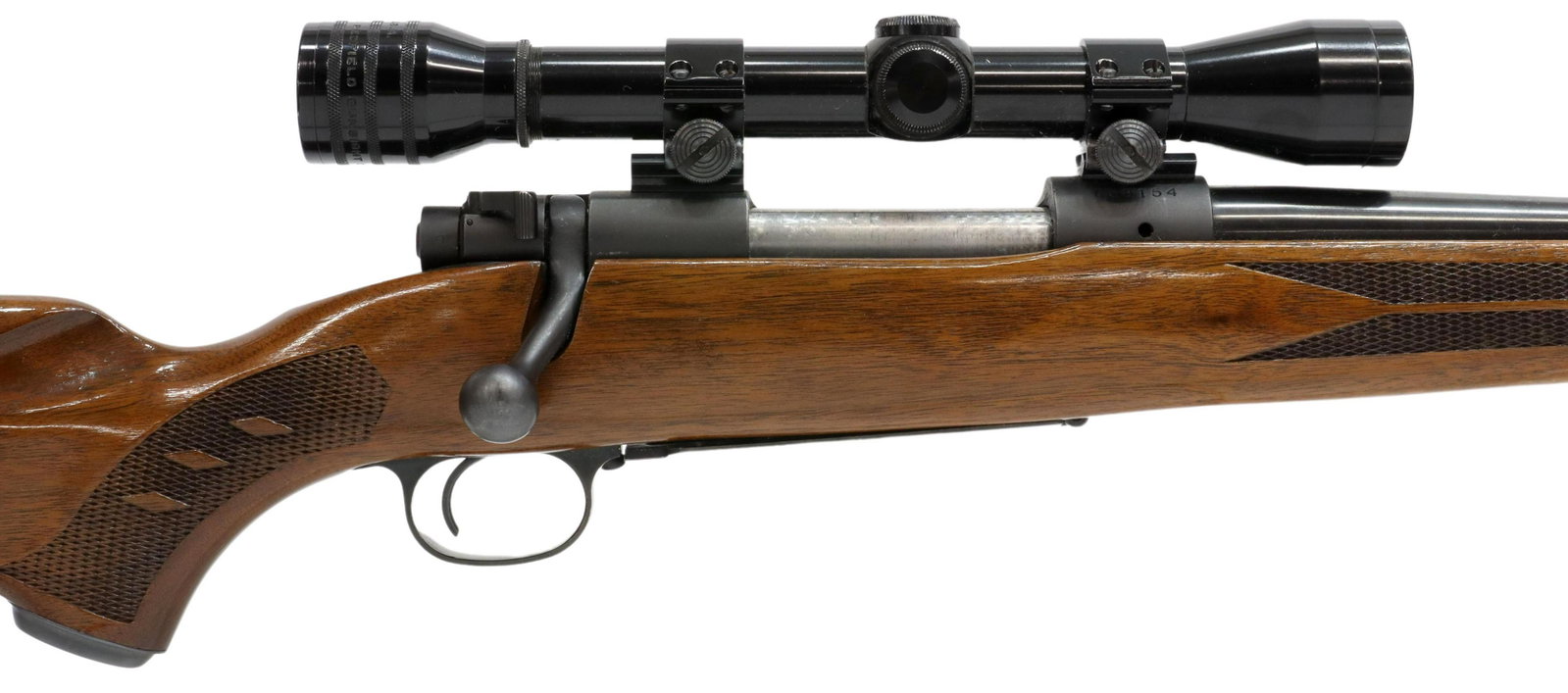 WINCHESTER MODEL 70 RIFLE, .30-06, REDFIELD SCOPE: Winchester Model 70 rifle, mfg.1964, bolt action,.30-06 Sprg., 22" barrel, ramp front sight, adjustable rear sight, mounted Redfield 4X sight, jeweled bolt, checkered walnut stock with cheekpiece, two