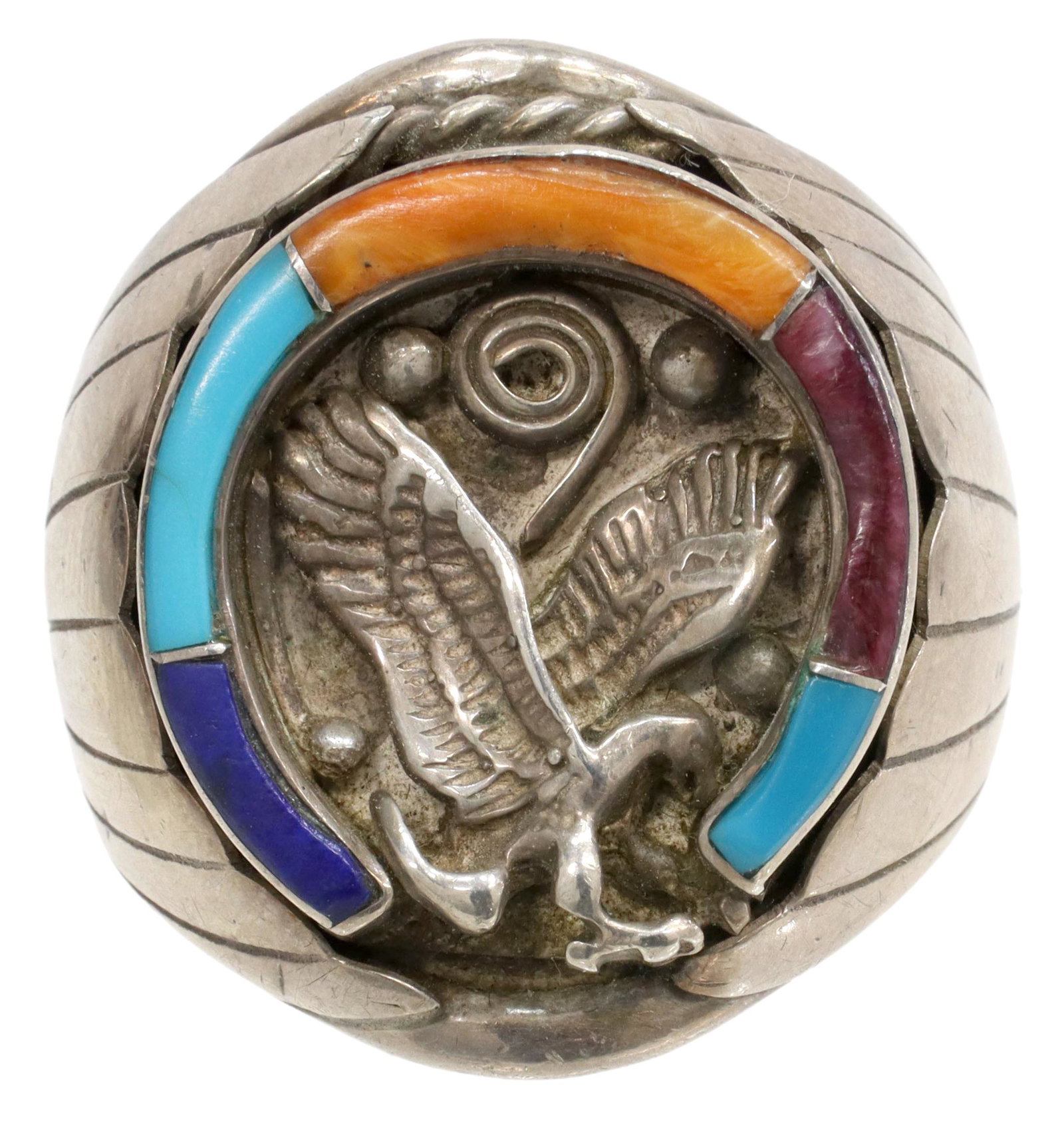 BOBBY JOHNSON (B.1952) NAVAJO SILVER EAGLE RING: Gent's Native American sterling silver ring, stamped BJ (Bobby Johnson, Navajo/ Dine, Church Rock, New Mexico, b.1952), central eagle framed by multi-stone horseshoe, approx size 12, 15.6 grams (inclu