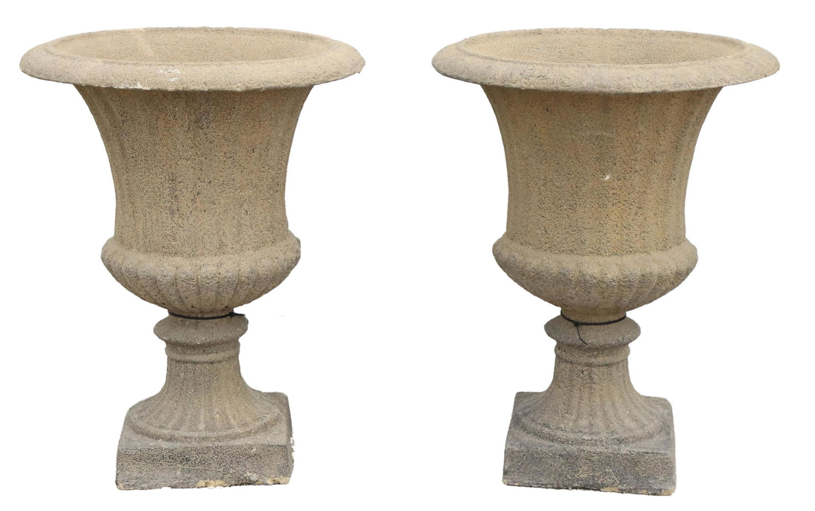 (2) CAST STONE HEATHFIELD GARDEN URN PLANTERS: (pair) Cast stone Heathfield campana-form garden urn planters, late 20th c., having wide rolled rim, over melon ribbed body, rising on square base, approx 30"h, 23.5"diam **PLEASE NOTE: All of the cas