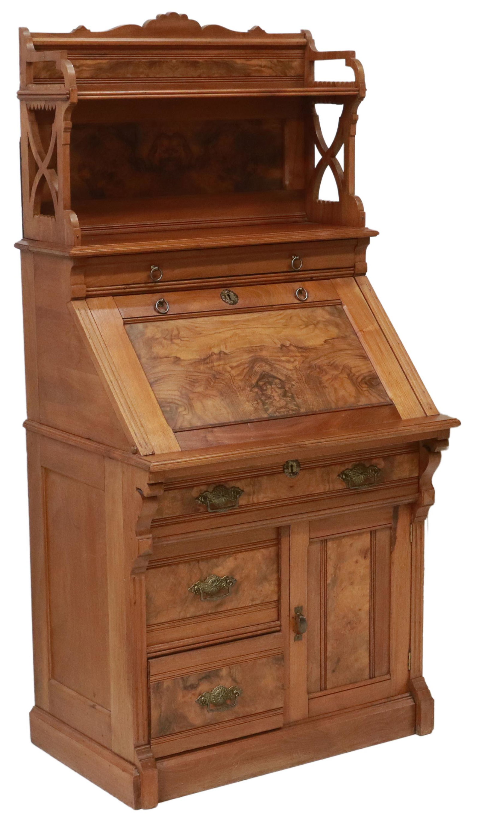AMERICAN EASTLAKE WALNUT SLANT FRONT DESK, 19TH C.: American Eastlake walnut slant front desk, late 19th c., raised back with open shelf, pierced sides, case accented with matched burlwood panels, single drawer above slant front, inset writing surface,