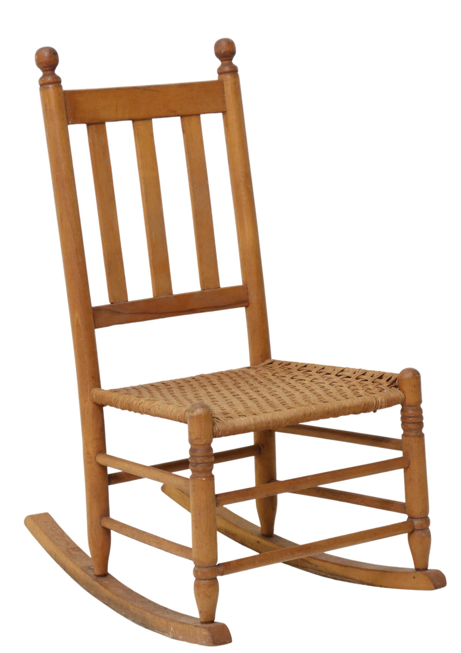 C.A. DAHLICH FURNITURE AUSTIN TEXAS ROCKING CHAIR: Wood rocking chair, C. A. Dahlich Furniture, Carpets, and Draperies, Austin, Texas, late 19th/ early 20th c., having turned finials, over slat back, woven seat, rising on turned legs, joined with doub