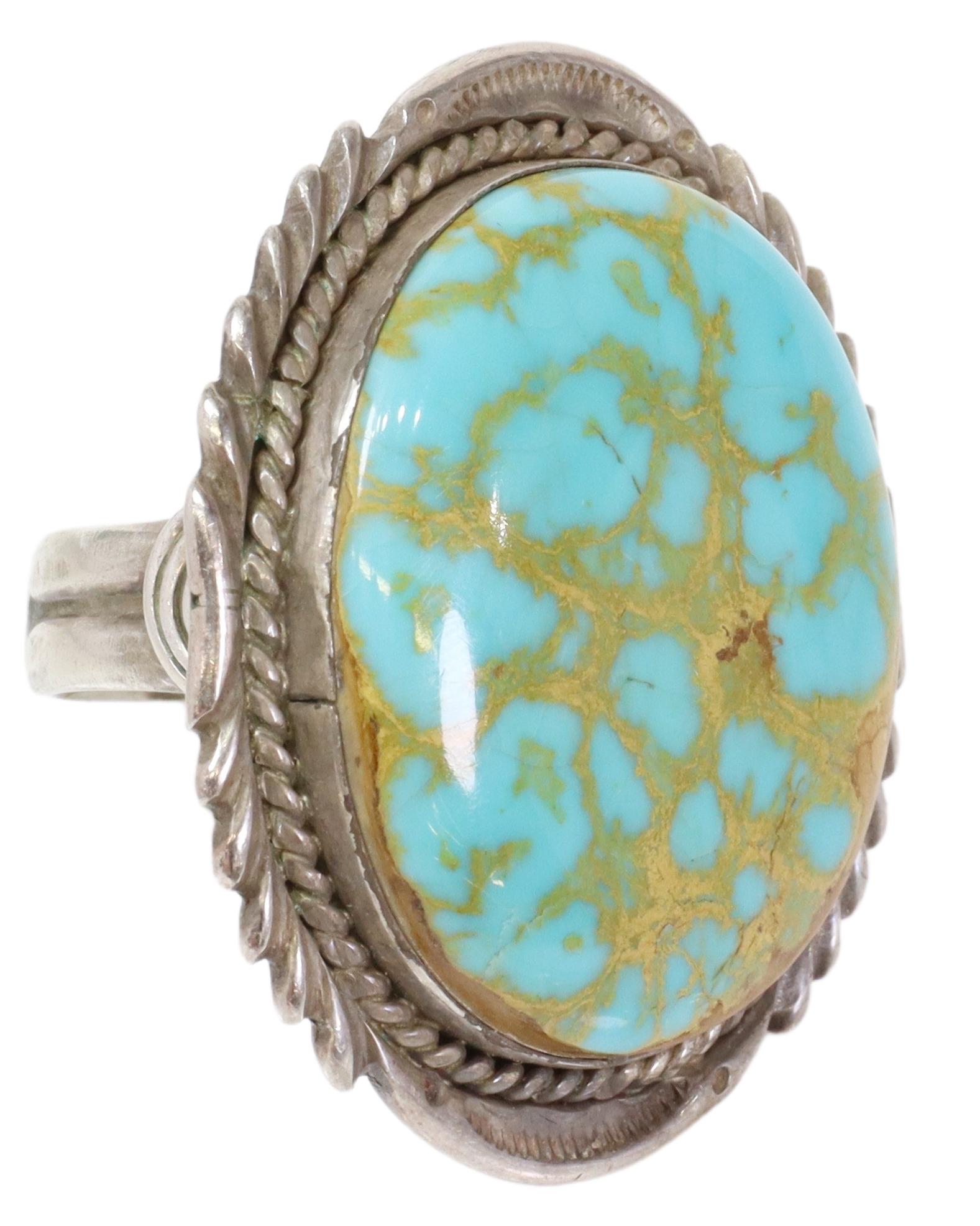 BEN BEGAY (B.1960) NAVAJO TURQUOISE STERLING RING: Gent's Native American sterling silver ring, Ben Begaye (Navajo/ Dine, b.1960), bezel-set turquoise cabochon, with twisted wire rope border, approx size 10.5, 26.6 grams (inclusive of all materials) *