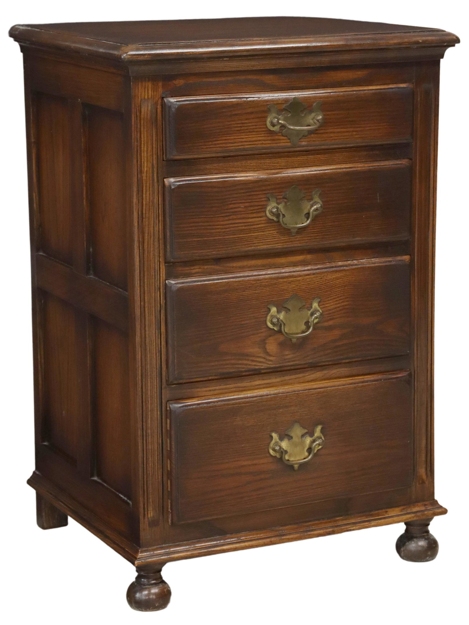 ENGLISH OAK NIGHTSTAND/ SMALL CHEST OF DRAWERS: English oak nightstand/ petite chest of drawers, 20th c., molded rectangular top, over four graduated drawers, paneled sides, rising on bun feet, approx 23.25"h, 18"w, 15.75"d Start Price: $100.00
