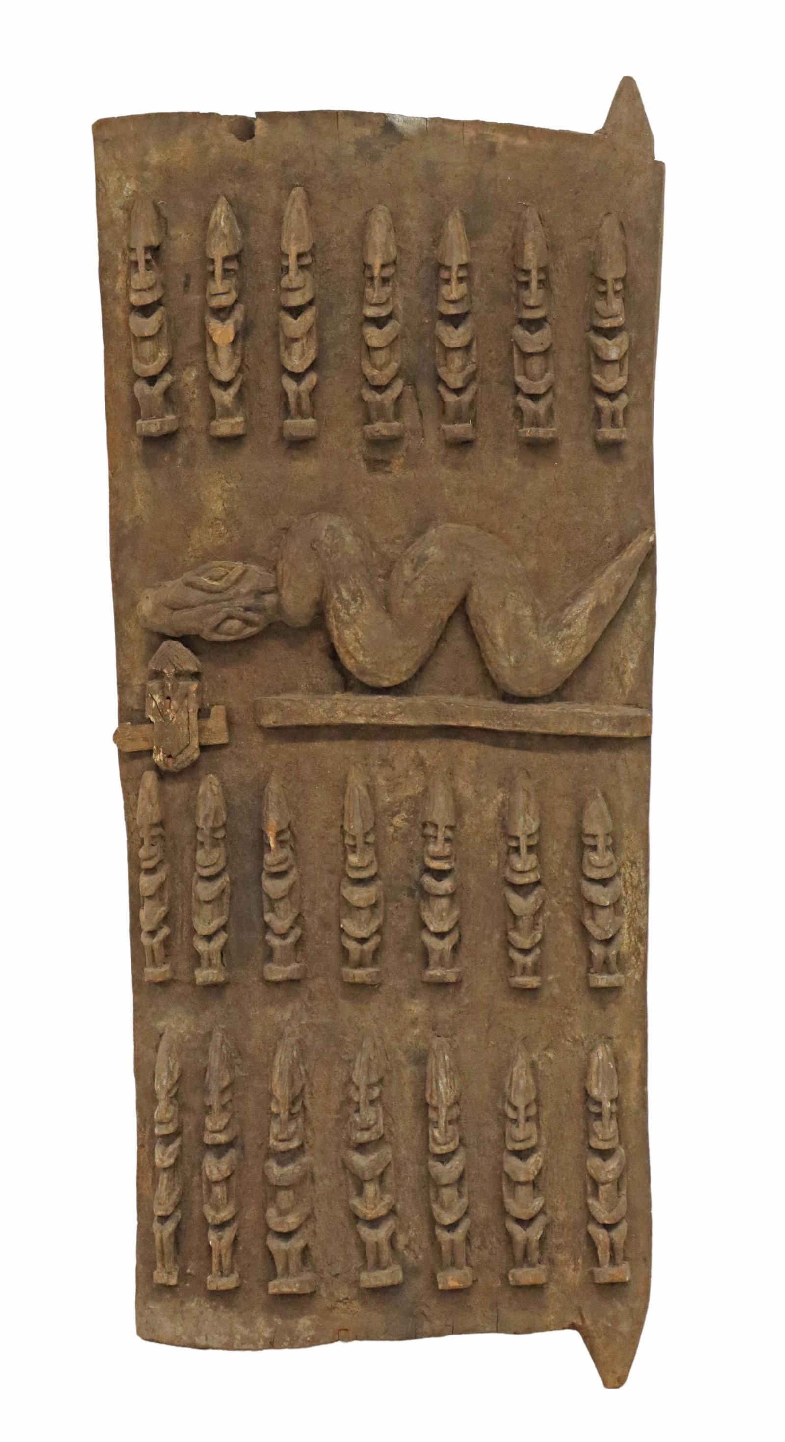 AFRICAN DOGON CARVED WOOD GRAINARY DOOR PANEL: African carved wood door panel, likely Dogon, Mali, depicting serpent and figures, approx 43"h, 19.5"w, 3"d, 13.7lbs **Provenance: From the collection of Mrs. Bettye Wellons, Austin, Texas** Start Pri