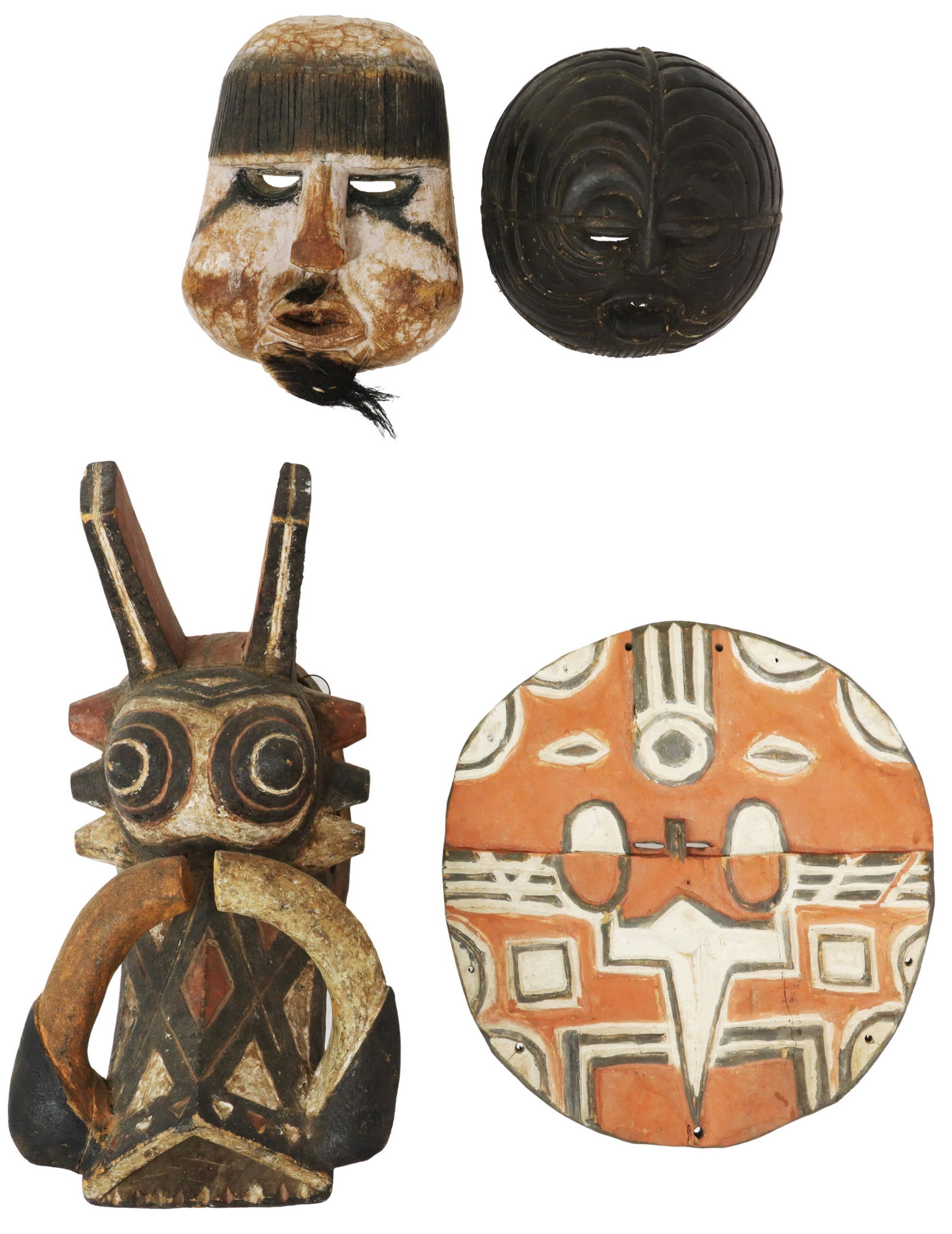 (4) AFRICAN TRIBAL CARVED WOOD MASKS: (lot of 4) African carved and painted wood masks, including: (1) warthog, Nunuma or Winiama peoples, Burkina Faso, approx 17"h, 8.5"w, 8"d; (1) human face with wide cheeks, carved fringe, natural hair