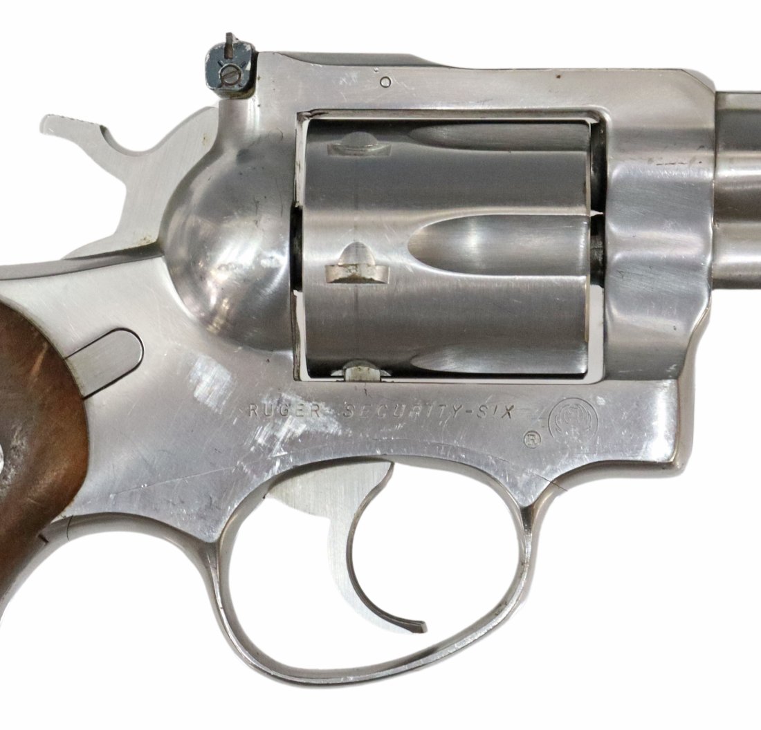 RUGER DA SECURITY SIX .357 CALIBER REVOLVER: Ruger Double Action Security Six Revolver, .357 caliber, 2.75" barrel, ramp front sight, adjustable rear sight, six round swingout cylinder, Ruger logo wood grips, stainless steel finish with scratche