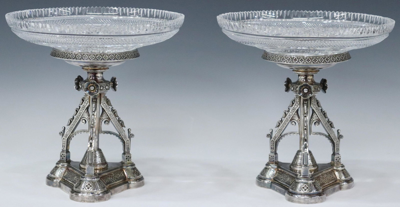 (2) ENGLISH HORACE WOODWARD SILVERPLATE COMPOTES: (pair) Victorian cut crystal and silverplate compotes, Horace Woodward & Company, c.1880, fitted with cut crystal bowl, having sawtooth rim, star pattern to bottom, rising on silverplate base, quatref