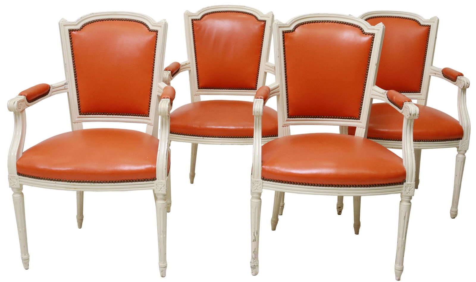 (4) LOUIS XVI STYLE PAINTED & LEATHER FAUTEUILS: (lot of 4) Louis XVI style white painted armchairs, 20th c., in orange leather upholstery, with nailhead trim, scrolled handholds, rising on tapered and fluted legs, approx 38.25"h, 24.25"w, 26"d, sea
