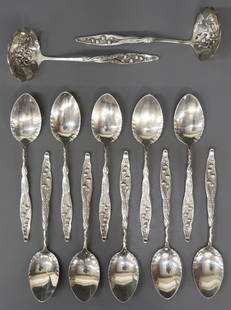 (12) WHITING LILY OF THE VALLEY STERLING FLATWARE: (lot of 12) American sterling silver flatware, Whiting Manufacturing Company, in the "Lily of the Valley" pattern, including: (10) ice cream spoons, approx 5 5/8"l, (2) ladles, (one) monogrammed B, ap