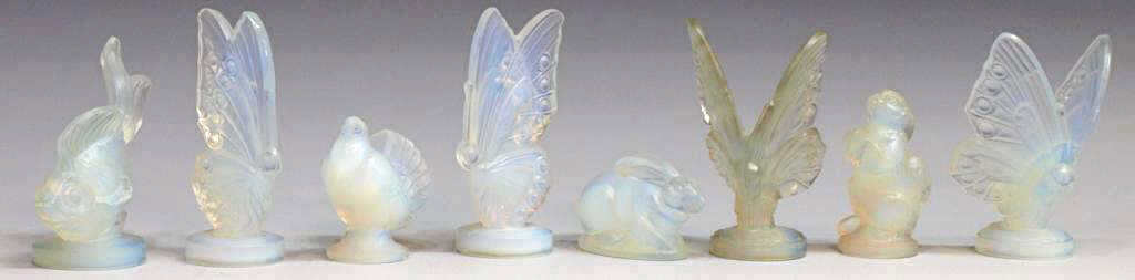 FRENCH SABINO GLASS OPALESCENT INSECTS & ANIMALS: (lot of 8) Collection of French Sabino opalescent glass figures including fish, butterflies and animals, incised 'Sabino France' and other marks, largest: 2.5"h, 1lb Start Price: $100.00