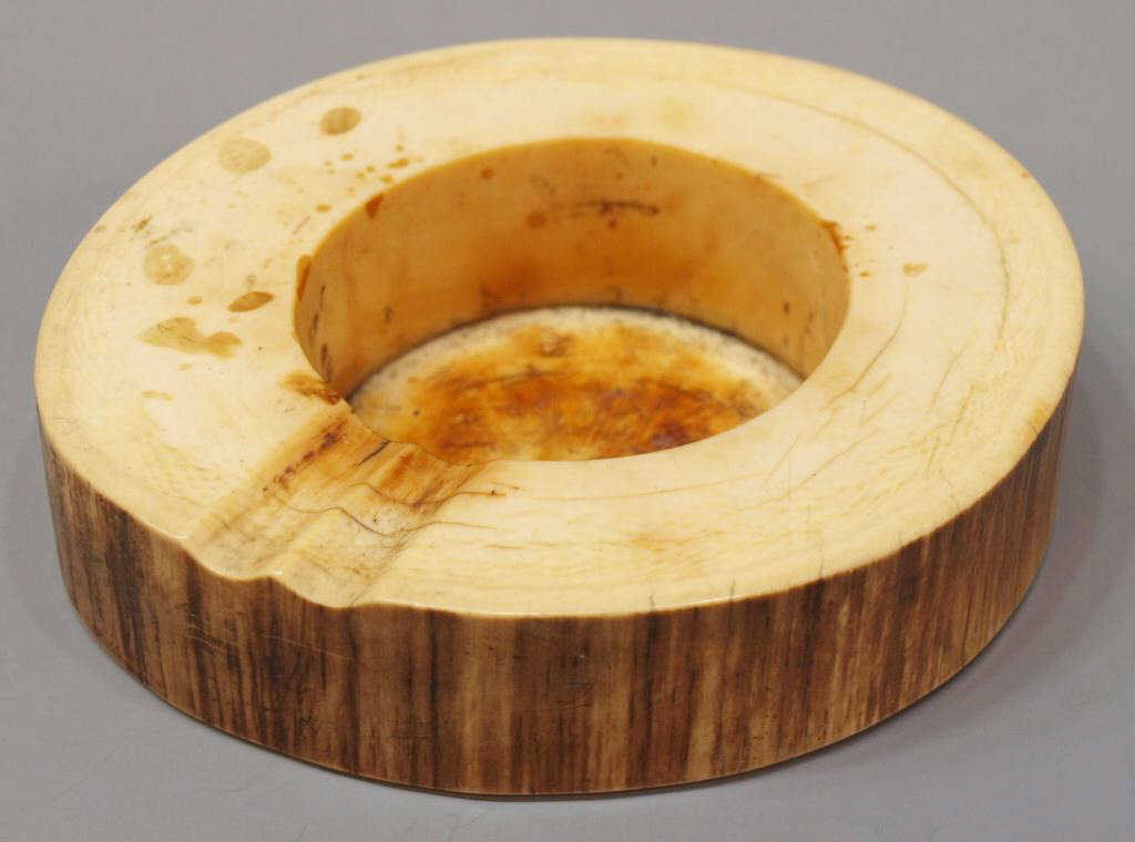 CARVED ELEPHANT TUSK ASH TRAY: **This item will not be shipped Internationally** Ivory ash tray fashioned from an elephant tusk, Africa, c. 1920's, 1.25"h, 4.75"w, 4"d Start Price: $50.00