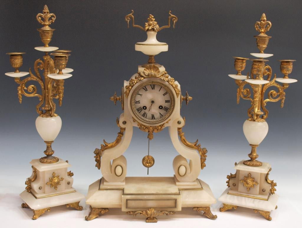 (3) FRENCH ALABASTER GARNITURE CLOCK SET, PARIS: (lot of 3) French alabaster garniture clock set, c. 1900, having time and strike works marked LM, Paris, made in the Louis XV style with mounted urn, brass foliate decoration, scroll supports and feet