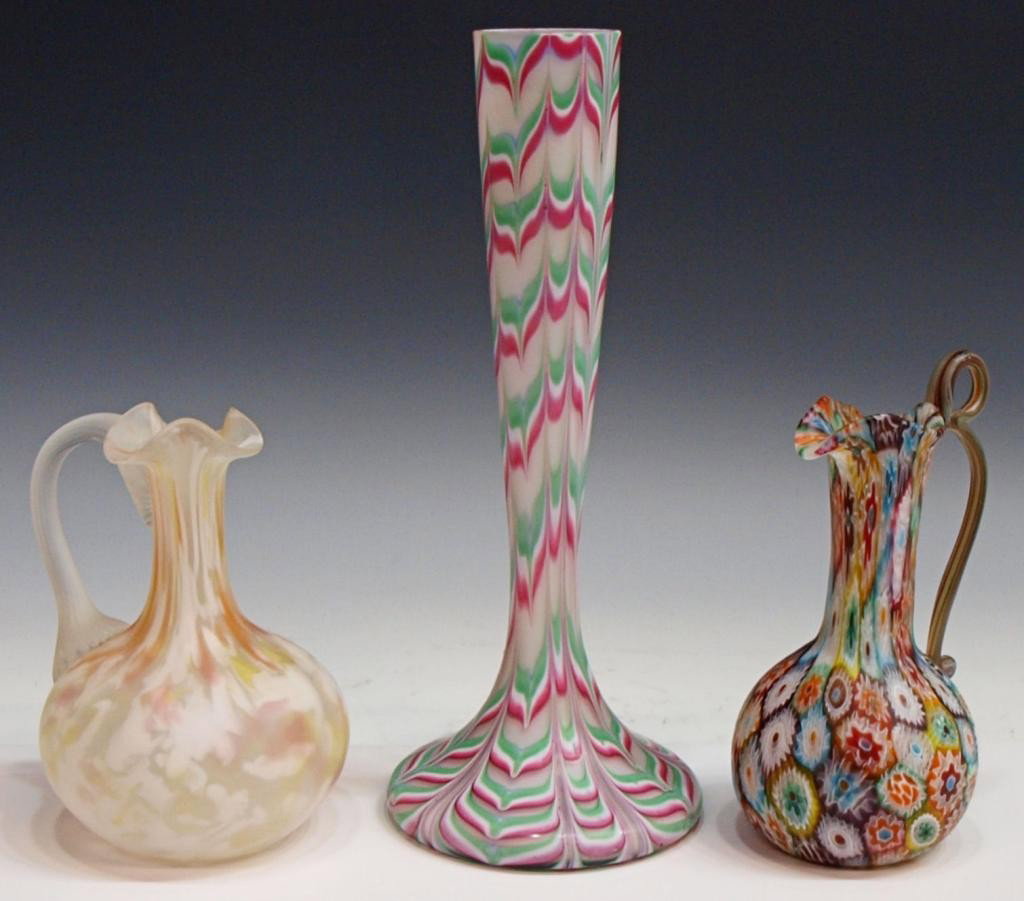 COLLECTION SATIN ART GLASS VASE & MILLEFIORI CRUET: (lot of 3) Art glass group comprising: (1) satin glass vase with pulled pink white and green design, very minor roughness/flakes at mouth 10"h; (1) millefiori cruet with decorative applied handle, 6.2