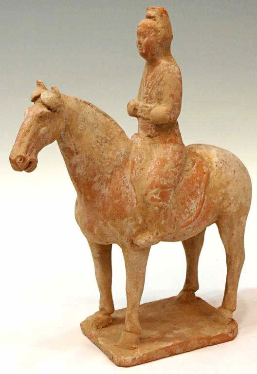 CHINESE TANG STYLE EQUESTRIAN FIGURE: Chinese Tang style unglazed pottery figure of an equestrian, , the seated figure in long robes, 11.25"l, 4"w, 4.75lbs**Provenance: From the private collection of a Colonel (ret.) in the United States