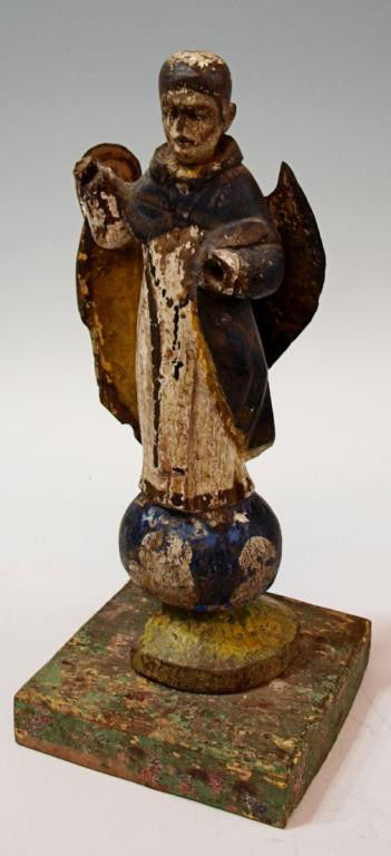 SPANISH COLONIAL RELIGIOUS STATUE, ST. MICHAEL: Spanish Colonial carved wood polychrome sculpture depicting Saint Michael the Archangel standing on an orb, taped tag of National Museum of the Philippines attached under base, paint loss, both hands