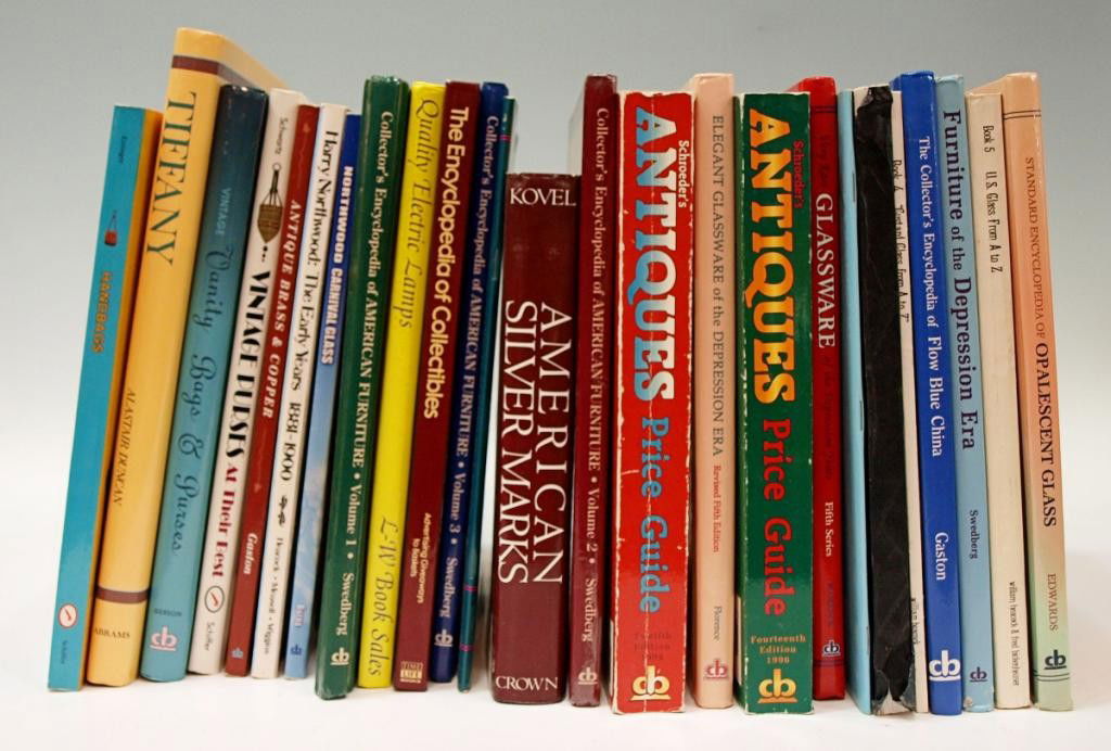(25) ANTIQUE COLLECTOR GUIDE REFERENCE BOOKS: (lot of 25) Collector reference books: (1) Louis Comfort Tiffany; (1) Handbags; (1) Encyclopedia of Flow Blue China; (1) Furniture of the Depression Era; (1) Victorian Colored Pattern Glass, Book 5; (