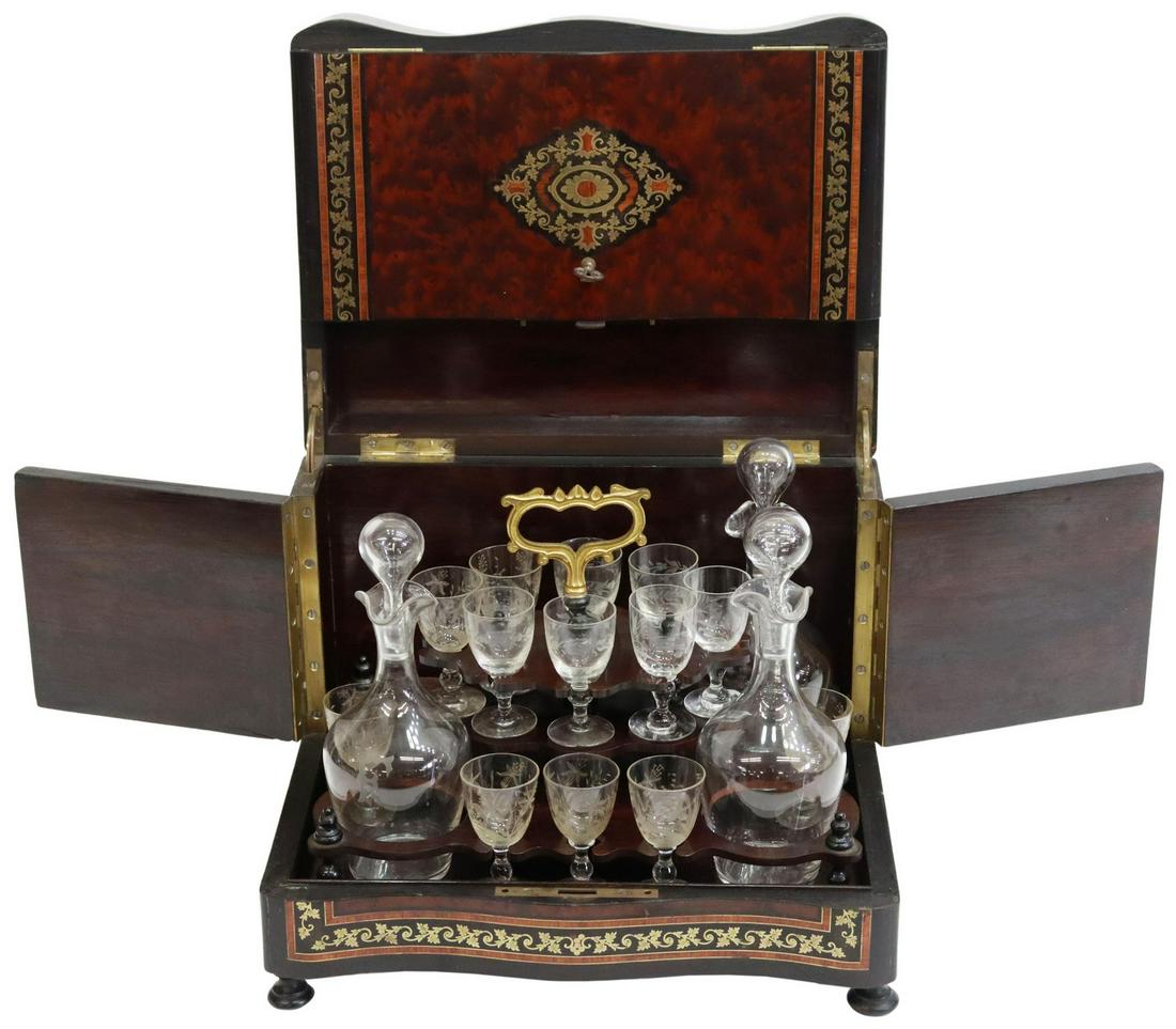 FRENCH NAPOLEON III PERIOD BURLWOOD CAVE A LIQUEUR: French Napoleon III period cave a liqueur, late 19th c., burlwood case with inlaid gilt metal foliate motifs, central "Virtute Militaire" incised shield emblem at top, removable cradle fitted with (3)