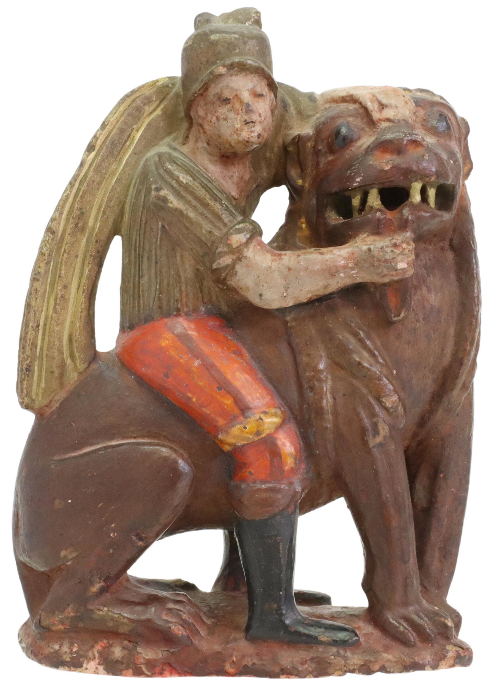CARVED & POLYCHROMED ALABASTER KNIGHT OF THE LION: Carved and polychrome decorated alabaster figure, likely English, a man with cloak on the back of a lion, possibly depicting Sir Ywain/ Yvain, Knight of the Lion, approx 7.5"h, 5.25"w, 2.25"d, 3lbs St