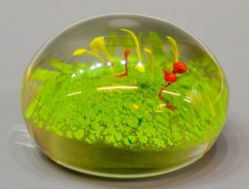 DOMINICK LABINO STUDIO ART GLASS PAPERWEIGHT: Dominick Labino (American, 1910-1987) studio art glass paperweight, 1985, cased green, red and yellow design with gold flecks, signed and dated, 2.5", .75lbs Start Price: $50.00