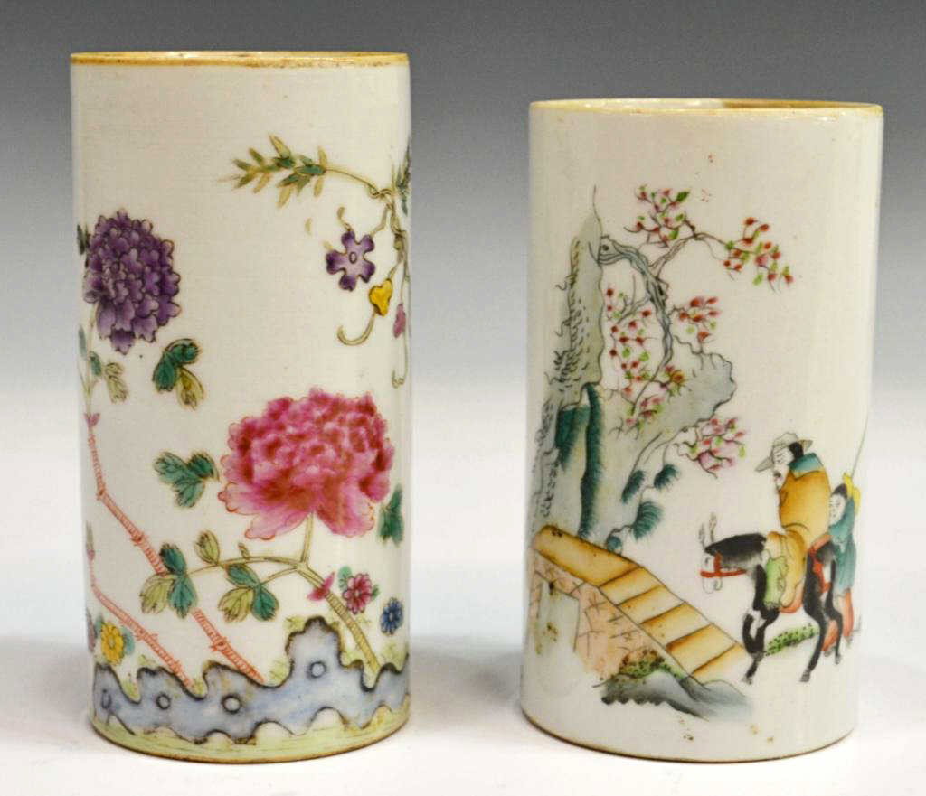 (2) CHINESE POLYCHROME PORCELAIN BRUSH HOLDERS: (lot of 2) Chinese polychrome porcelain brush holders, both signed a base, one decorated with flowers and bats, the other with an old man on a donkey, largest: 5"h, 2.5"d, 1lb Start Price: $150.00