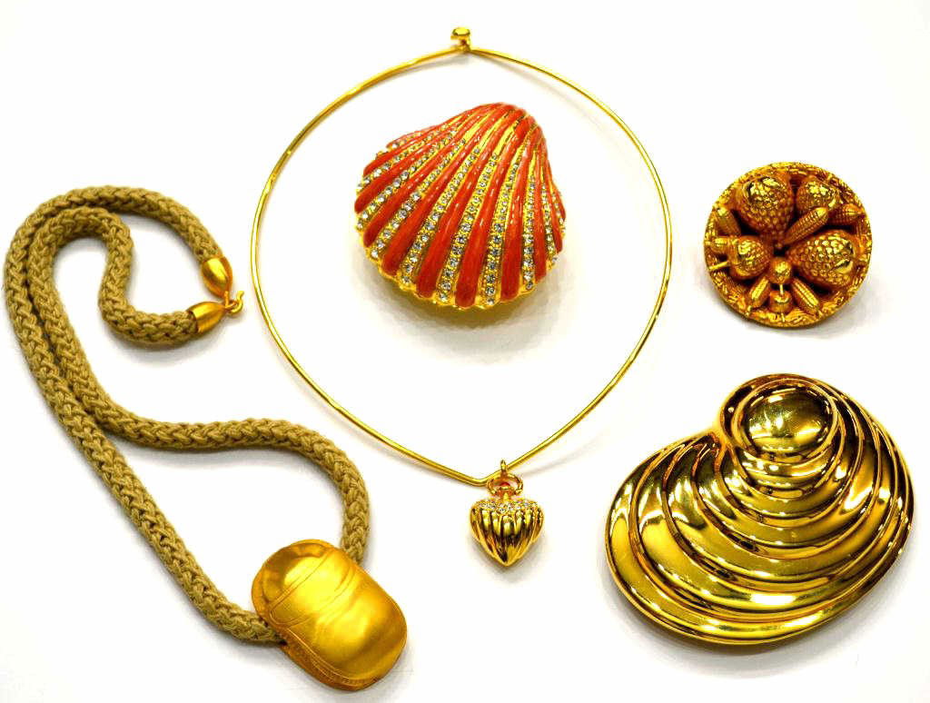 ALEXIS KIRK SHELL BUCK, DOMINIQUE AURIENTIS PIN: (lot of 5) Group of vintage and costume jewelry: (1) Dominique Aurientis gold tone brooch formed as a basket full of vegetables, 2.25"diam; (1) large Alexis Kirk gold tone buckle of shell form, 4.5"l,