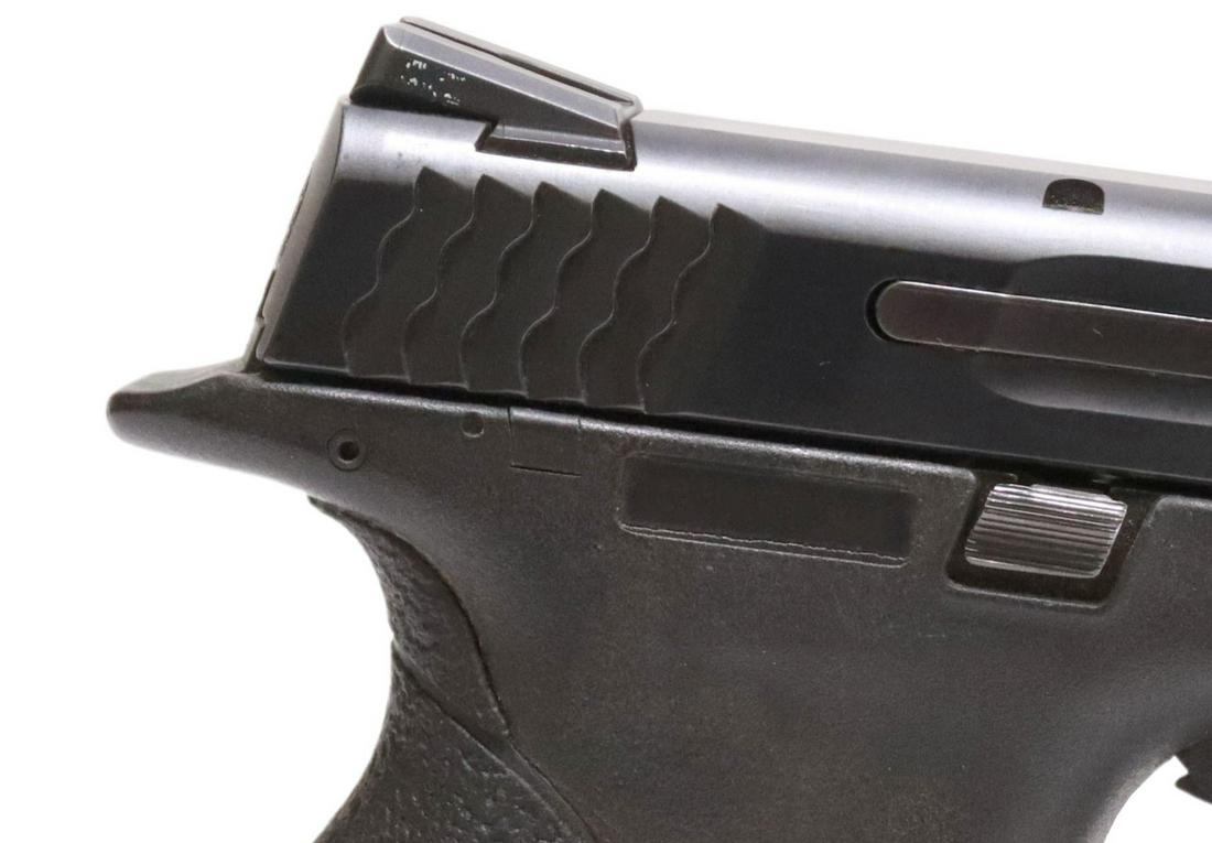 SMITH & WESSON M&P .45 CALIBER PISTOL: Smith & Wesson M&P pistol, .45 caliber, 4" barrel, adjustable front and rear sights, black stainless slide, black polymer frame with front accessory rail, two spare magazines, housed in S&W hard case,