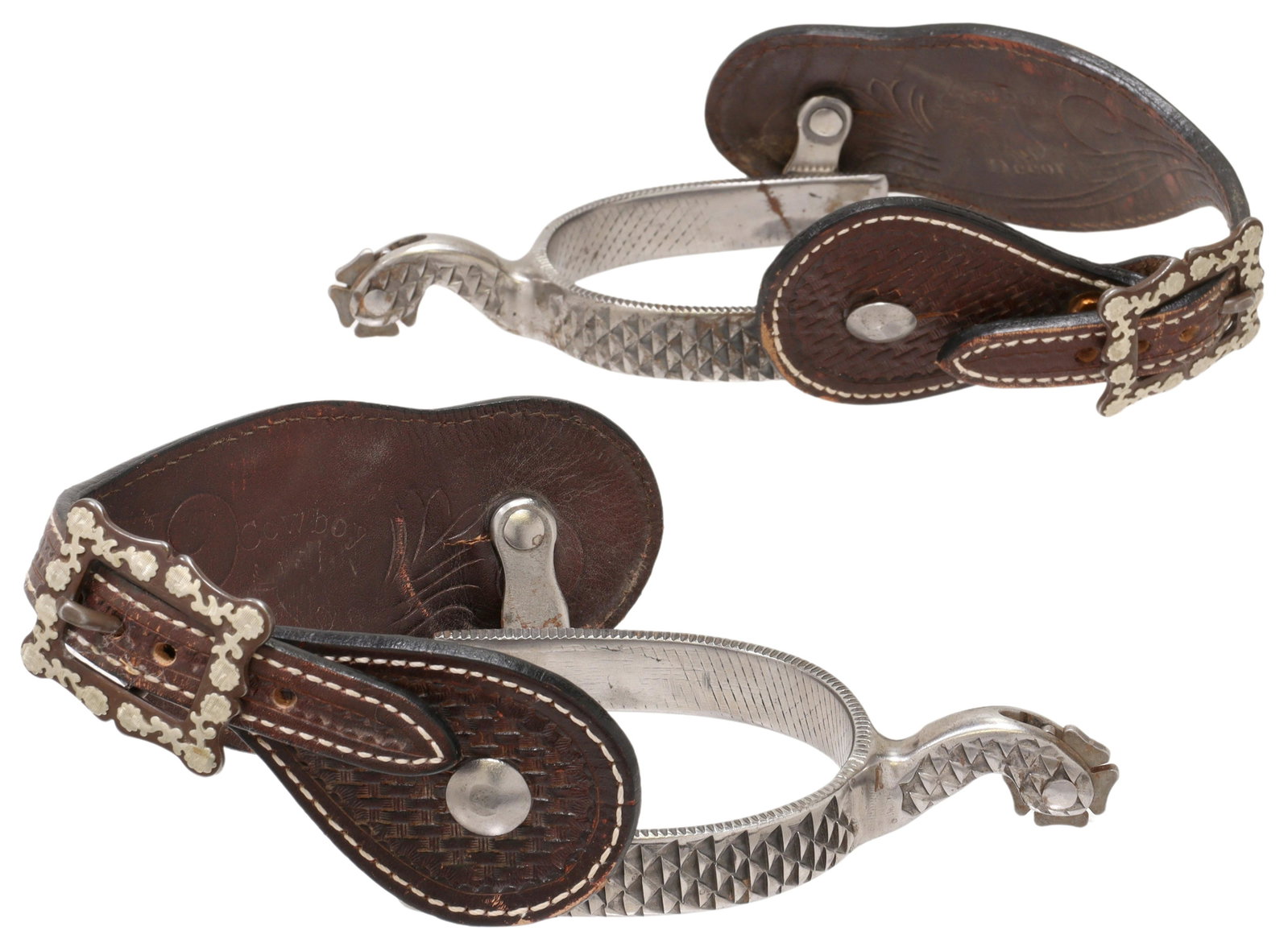 (PR) WESTERN TOMMY THOMPSON STEEL RASP SPURS: (pair) Western cowboy rasp spurs, TNT (Tommy N. Thompson), steel shank, 7/8" five-point clover rowels, tooled leather straps with basket weave pattern, leathers and buckle marked Cowboy Decor, yoke: a