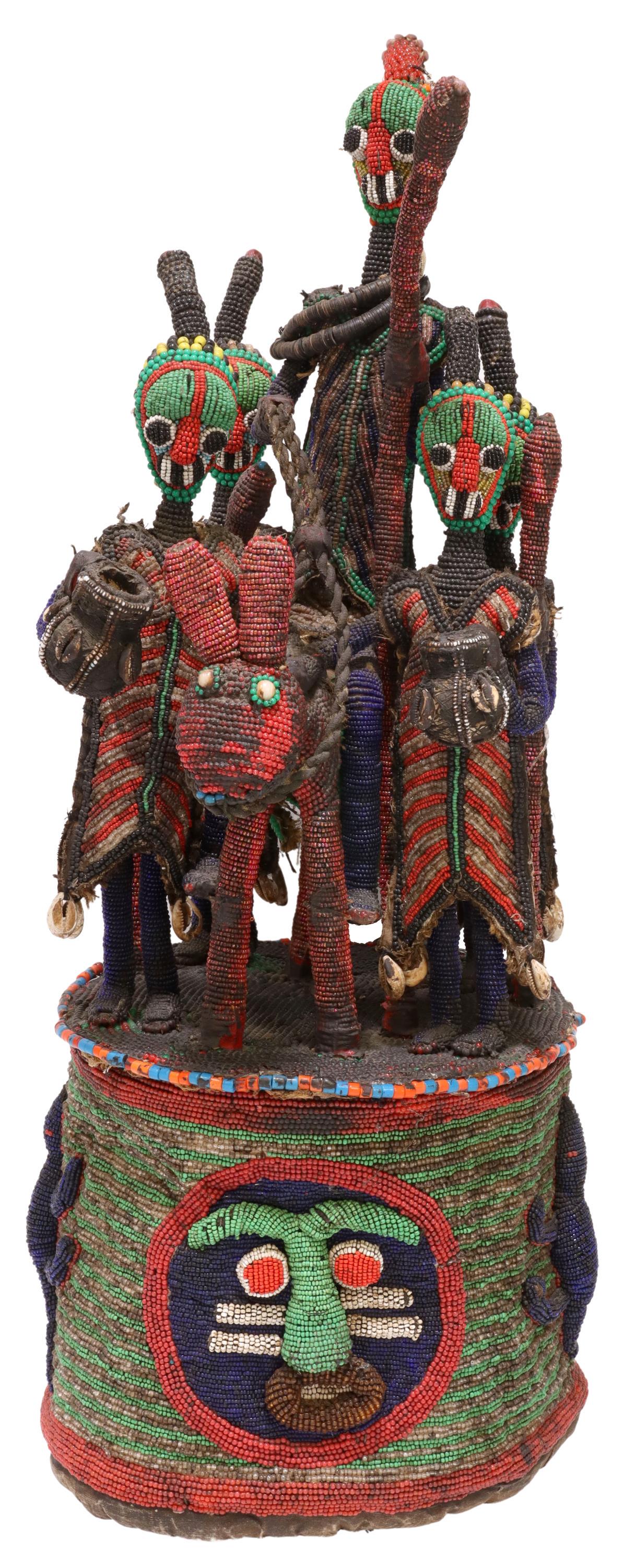 AFRICAN TRIBAL YORUBA BEADED HEADDRESS, NIGERIA: African tribal beaded headdress, the Yoruba peoples, Nigeria, central figure riding animal figure, flanked by four standing figures, atop cylindrical crown, adorned with lizards, approx 29"h, 10.5"w, 