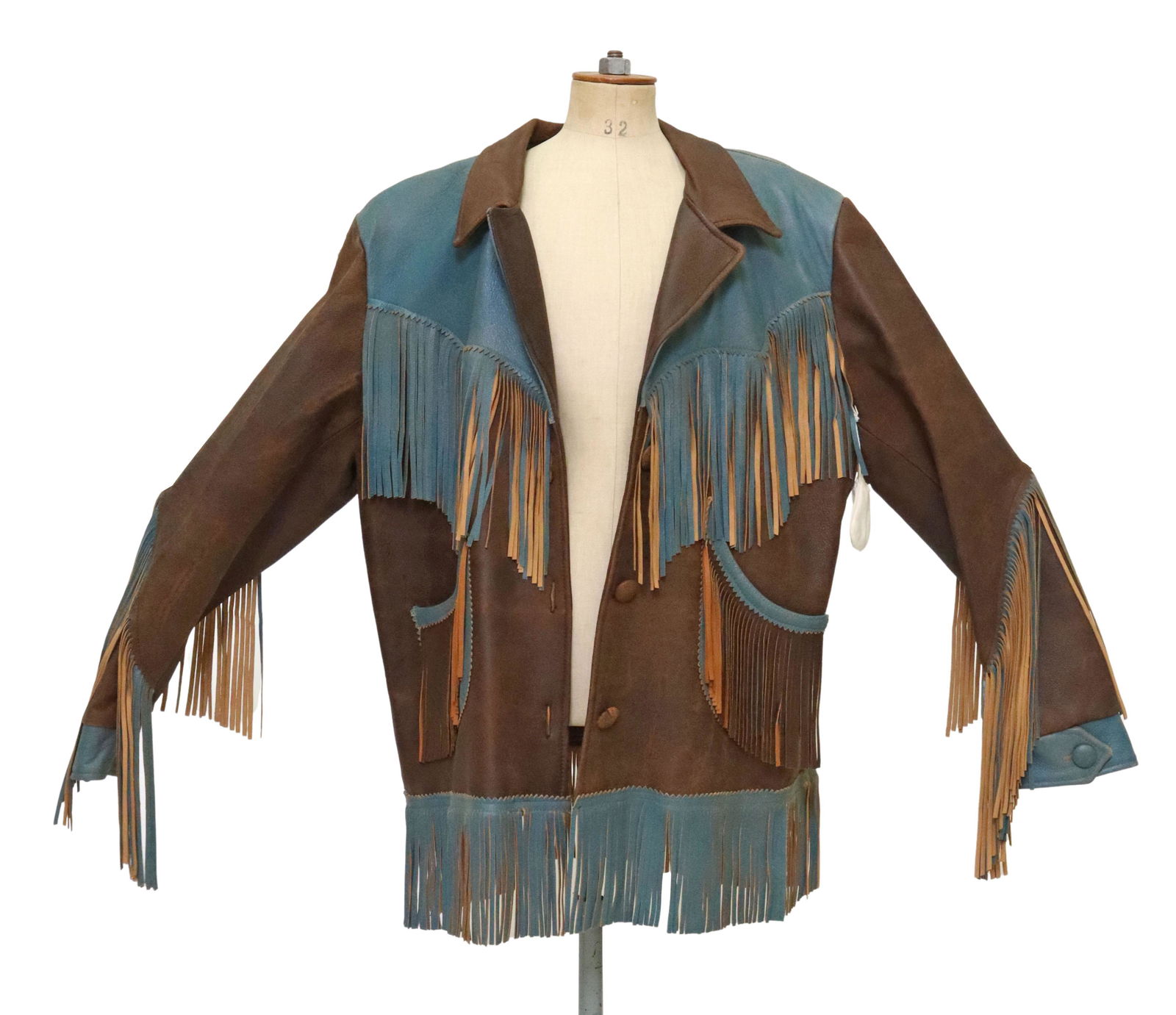 LADIES DOUBLE D RANCHWEAR FRINGED LEATHER COAT: Ladies leather coat, Double D Ranchwear, Yoakum, Texas, blue and dark brown, marked size extra-large, two side pockets, three brown leather 1" diameter buttons, fringe at shoulders, arms, hem, front a