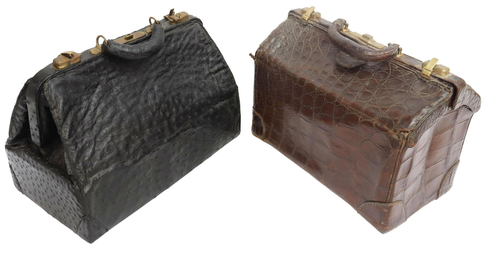 (2) EXOTIC LEATHER TRAVELING DOCTOR'S BAGS: (lot of 2) Exotic leather traveling doctor's bags, both with metal locks and clasps, including: (1) brown alligator bag, opening to red leather interior, approx 12"h, 17"w, 10"d, (1) black ostrich bag