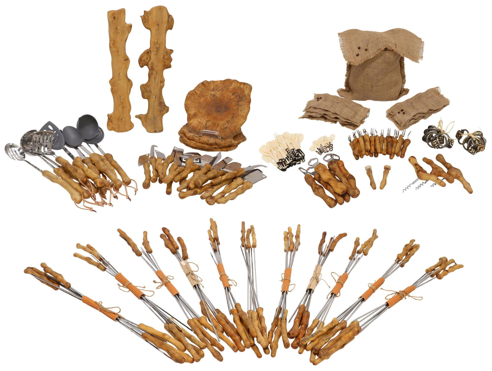 (LOT) LARGE GROUP AFRICAN WOOD HANDLED SERVICEWARE: (lot) Large collection of African natural wood handled and other table and serviceware, all appearing as unused/ new, including, wood cheese trays with accompanying knives, skewers, bottle openers, co