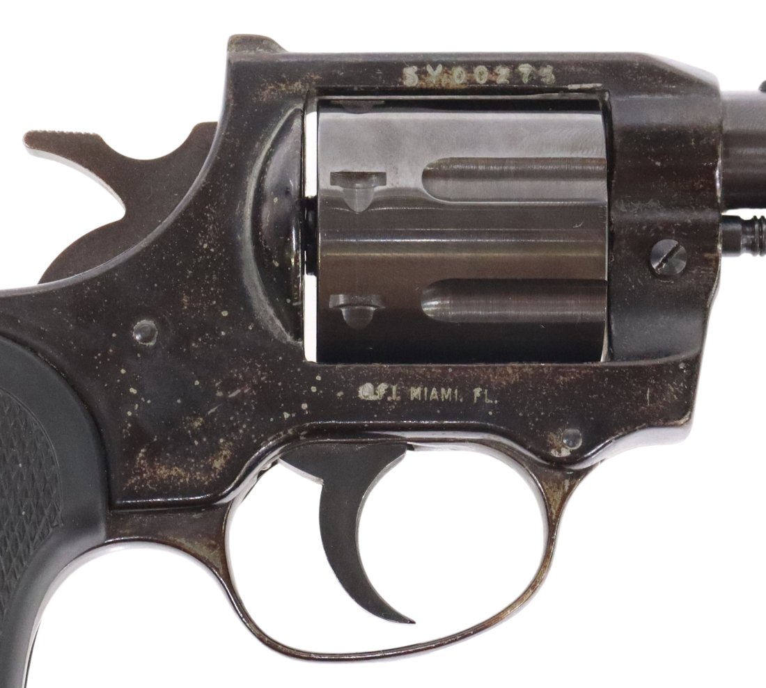 QFI DOUBLE ACTION .32 H&R SEVEN ROUND REVOLVER: Q.F.I., Miami Import revolver, believed to be German made, double action, .32 H&R caliber, 2" barrel, fixed front sight, fixed rear sight, seven round cylinder with removable arbor for loading, black 