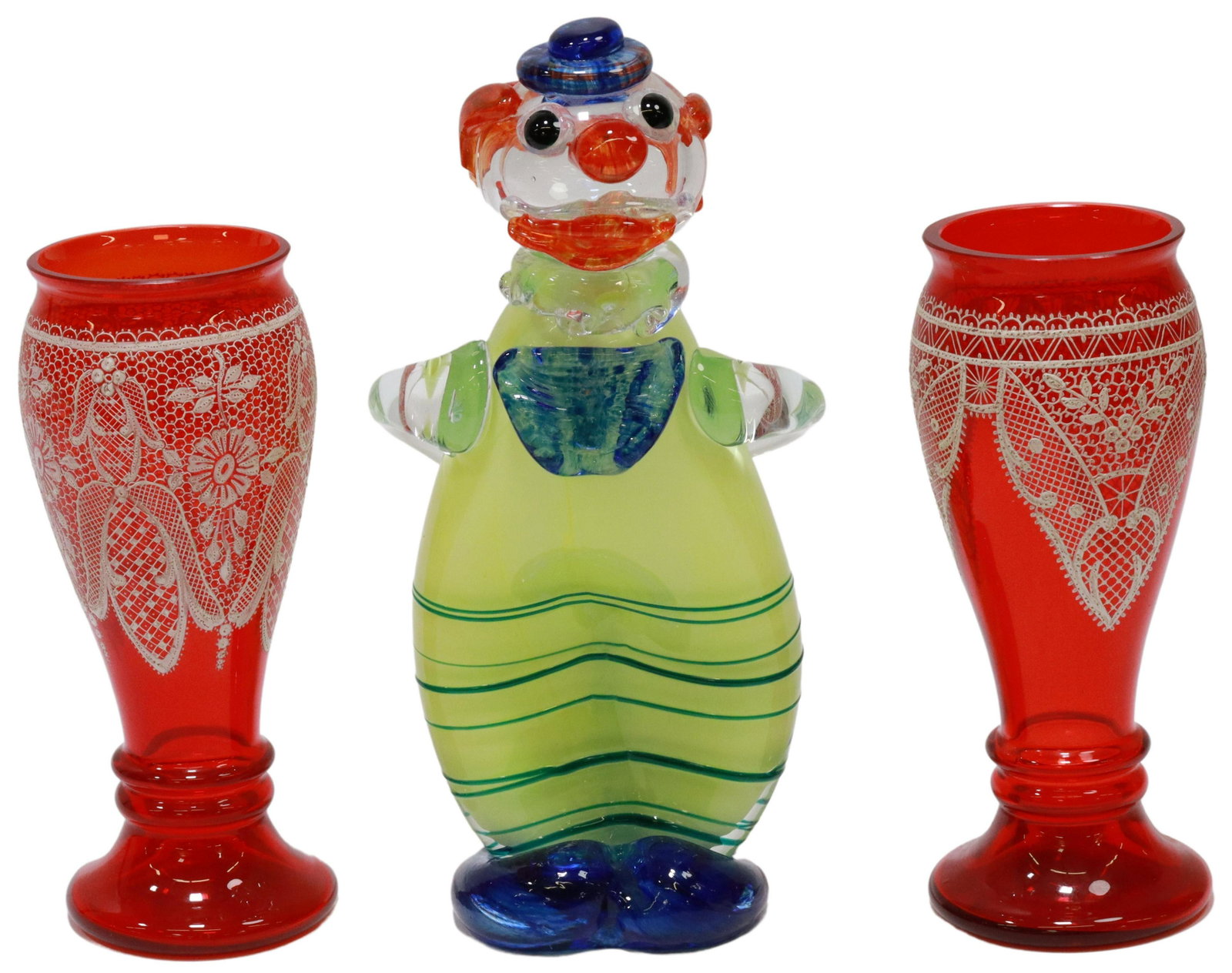(3) VENETIAN GLASS LACE VASES & ART GLASS CLOWN: (lot of 3) Italian glass, including: (2) Venetian red glass vases, with enameled lace design, (one) retaining partial paper label with lion of Saint Mark, some wear to enamel, (one) with small chip at