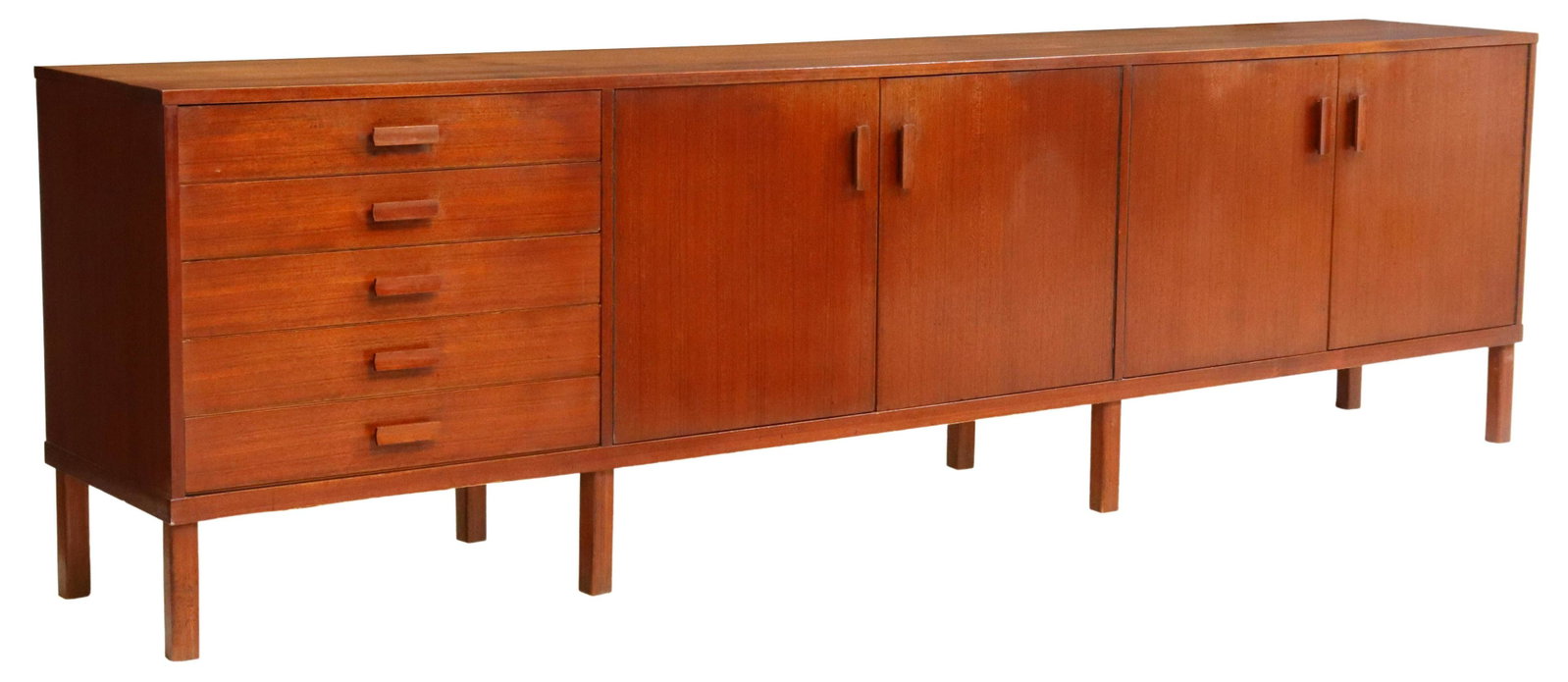 ITALIAN MID-CENTURY MODERN TEAK SIDEBOARD: Italian mid-century modern teak sideboard, c. 1950s, case fitted with five drawers to the far left, top drawer with silverware compartment, four cabinets, rising on block legs, approx 30"h, 105"w, 18.