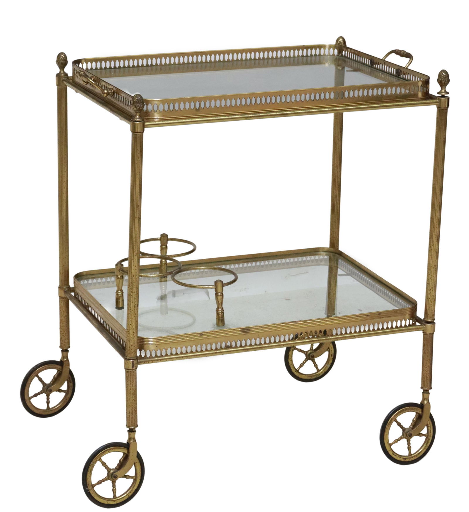 ITALIAN GILT METAL & GLASS TRAY-TOP BAR CART: Italian two-tier bar cart/ service trolley, mid 20th c., having removable tray top with pierced metal gallery, lower tier with three bottle holder rings, fluted cylindrical supports, rising on casters