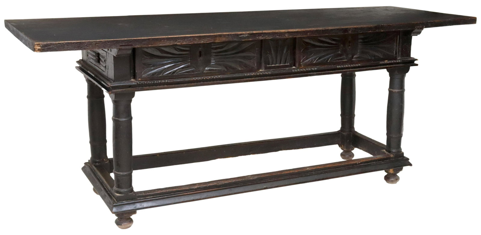 LARGE SPANISH BAROQUE STYLE EBONIZED TABLE, 83"L: Large Spanish Baroque style ebonized table, 19th c., overhanging top, carved apron with two frieze drawers, rising on turned legs, joined by box stretcher, wood loss, approx 32.5"h, 83"l, 26.25"w Star