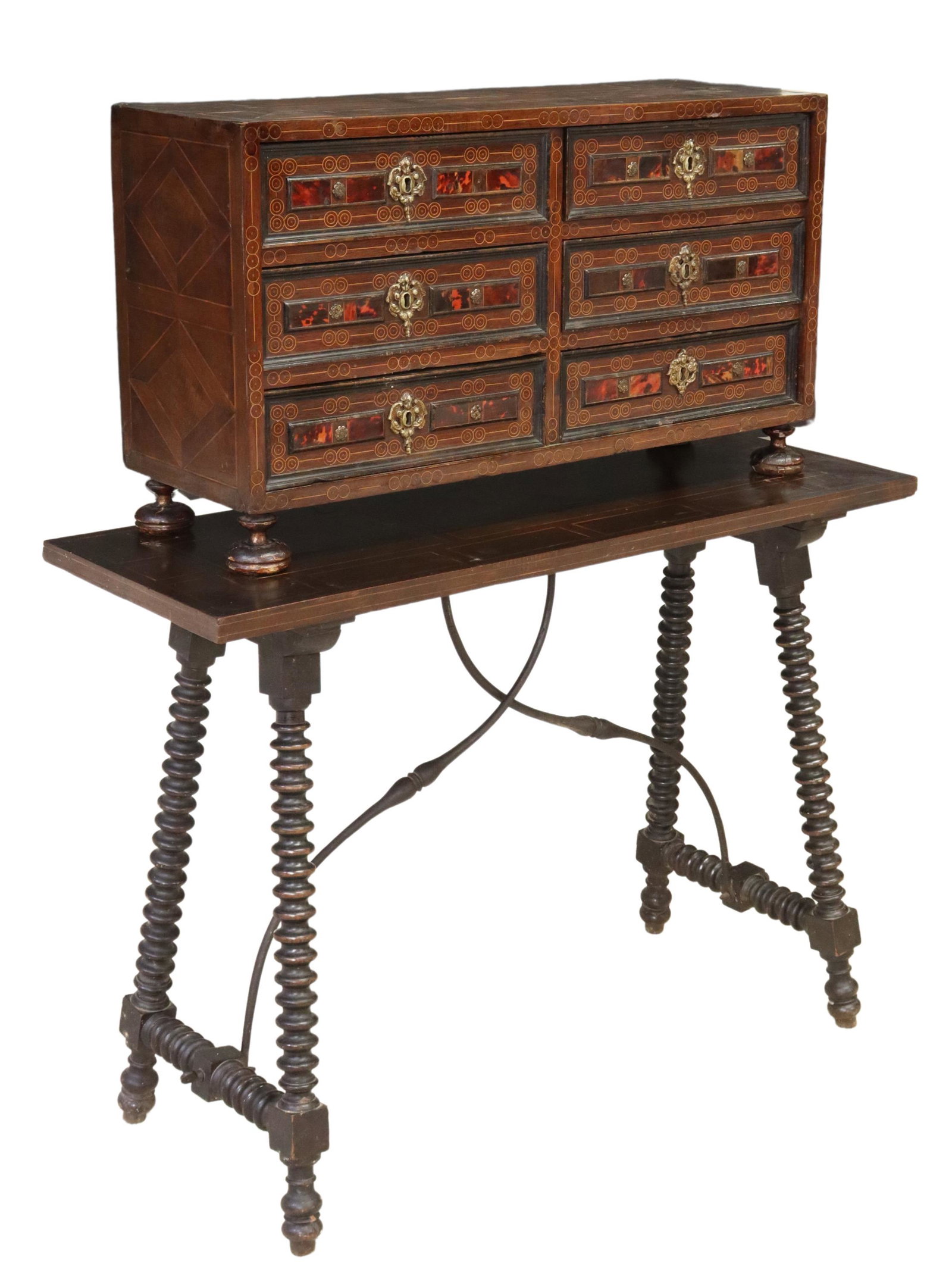 SPANISH BAROQUE STYLE VARGUENO ON STAND, 19TH C.: Spanish Baroque style bargueno/ vargueno on stand, 19th c., having six drawers with inlaid shell drawer fronts, rising on bun feet, resting on rectangular table with inlaid stringwork, on spool legs, 