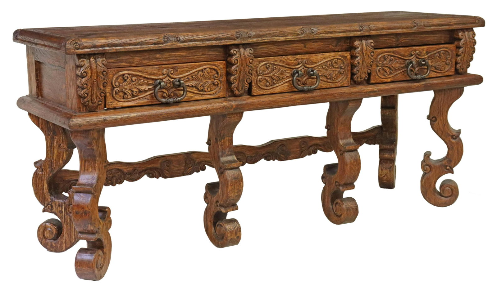 JASON SCOTT 'SANTANA' CARVED TEAK CONSOLE TABLE: Baroque style "Santana" carved teakwood console table, Jason Scott Collection, having carved foliate border, over three drawers, with iron bail handles, rising on large carved scrolled legs, joined wi