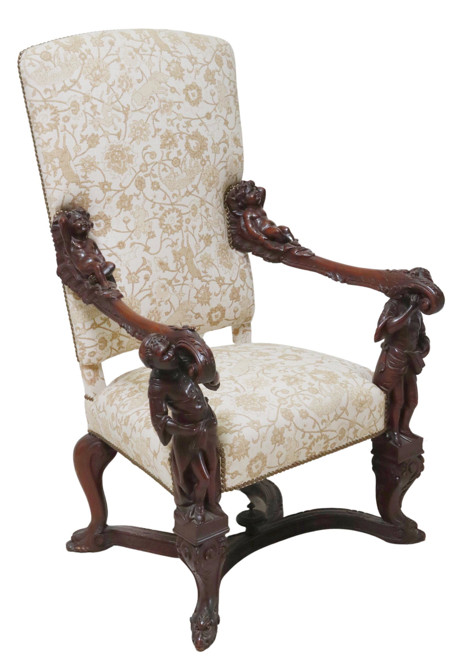 ITALIAN BAROQUE STYLE CARVED HIGHBACK ARMCHAIR: Italian Baroque style carved highback armchair, 19th/ 20th c., in the manner of Andrea Brustolon (Italian, 1662-1732), back and seat in patterned upholstery, with nailhead trim, reclining putto arms, 