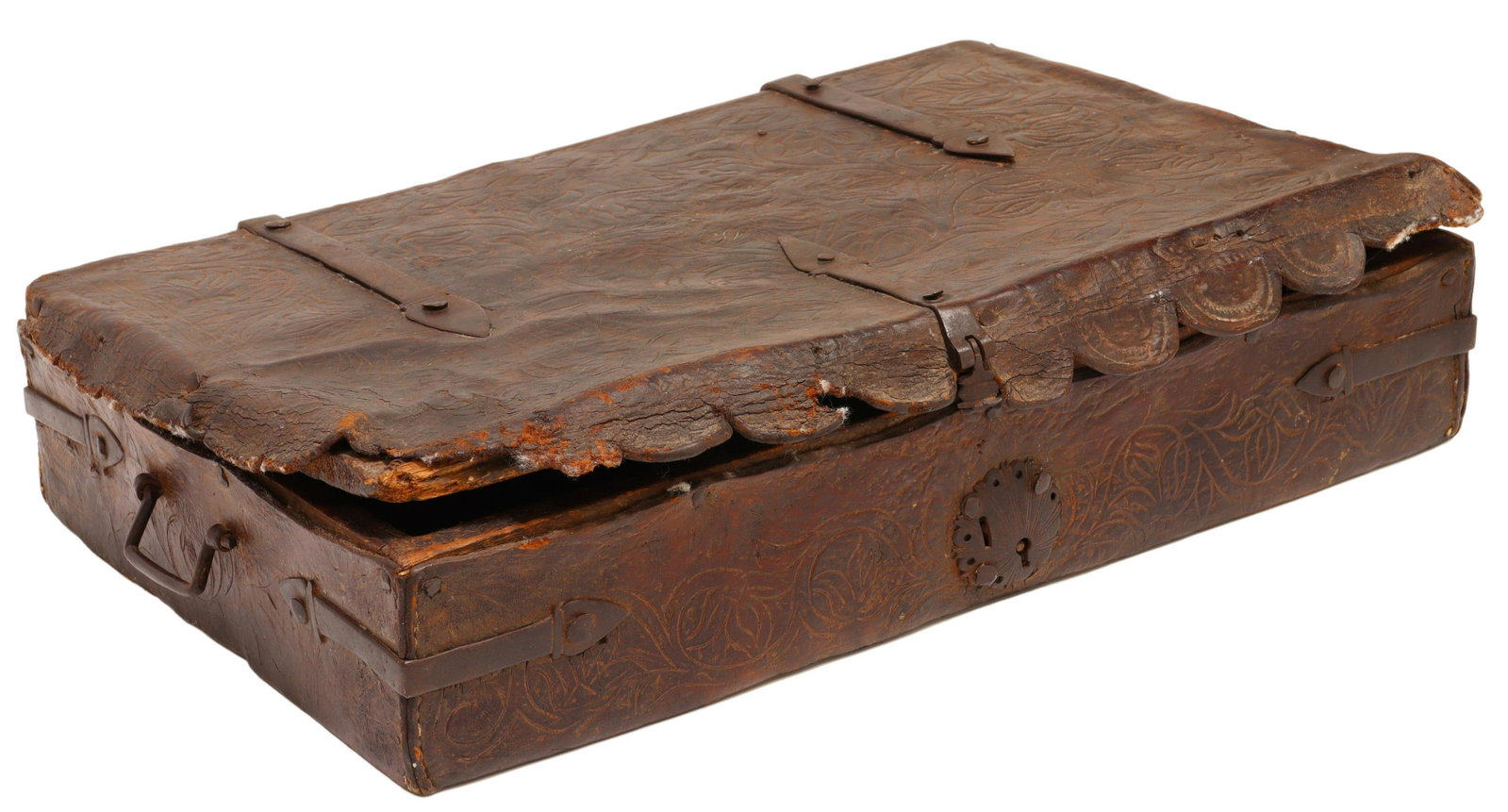 SPANISH FOLIATE TOOLED LEATHER DOCUMENT BOX: Spanish tooled leather document box, 18th c., figural and foliate tooled design, scalloped edges, strapped iron with shell design lockplate, handles to either side, hinged lid opening to remnants of o