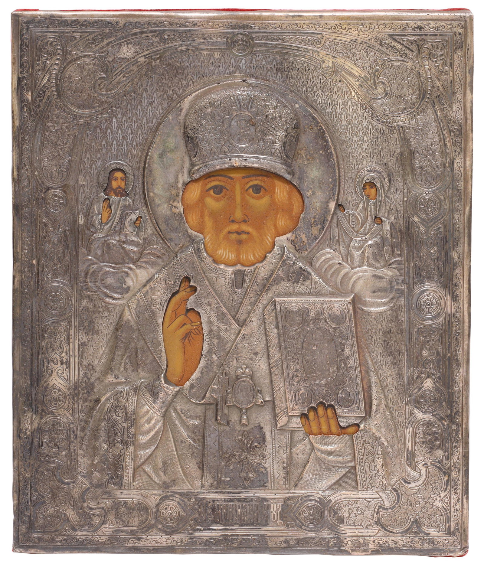 RUSSIAN ORTHODOX RELIGIOUS ICON SAINT NICHOLAS: Russian Orthodox religious icon, Saint Nicholas of Myra, silvered metal riza/ oklad with chased details, over painted panel, riza marked MET (?), approx 10.25"h, 8.75"w, 1"d, 2.5lbs total (for shippin