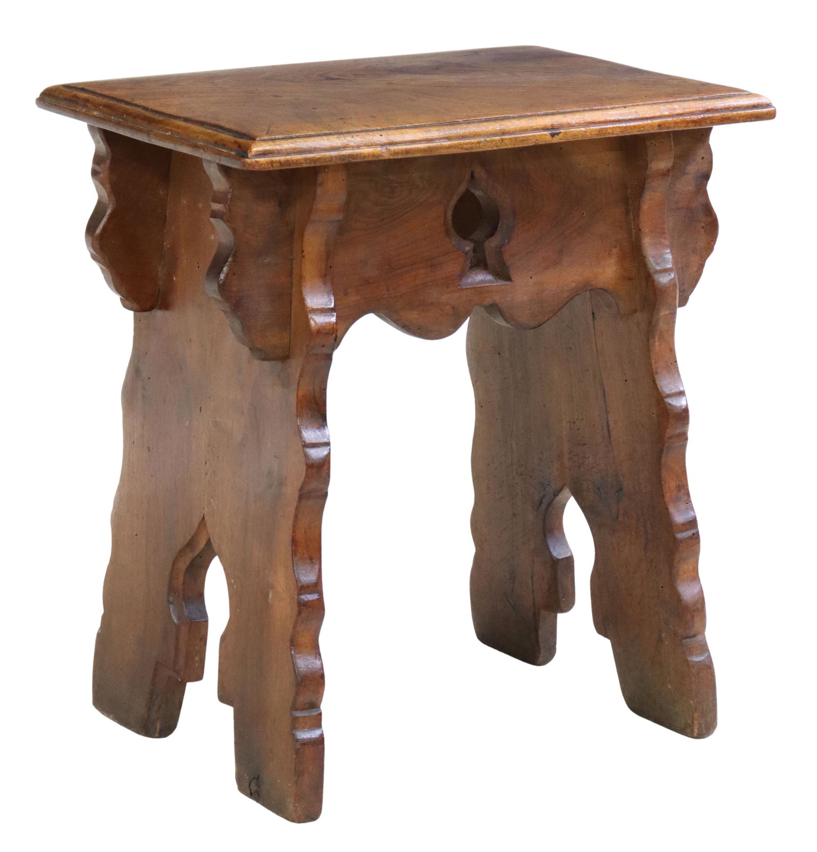 SPANISH BAROQUE STYLE WALNUT STOOL, BOOTJACK LEGS: Spanish Baroque style walnut stool, 19th c., keyhole carved apron, rising on bootjack supports, approx 20"h, 18.25"w, 12.75"d Start Price: $100.00