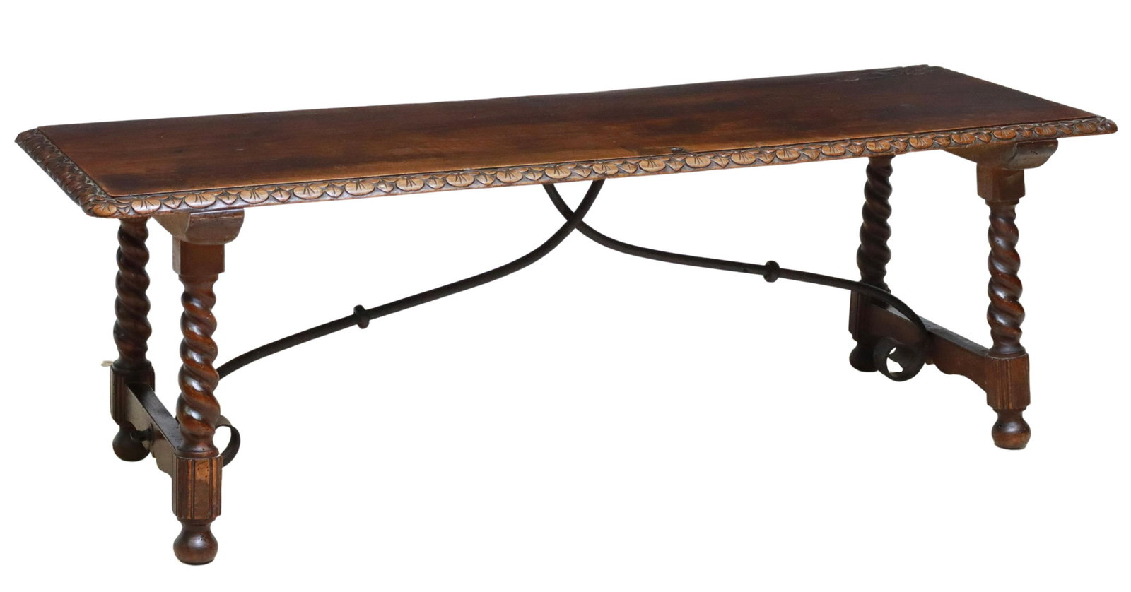 SPANISH BAROQUE STYLE CARVED WOOD & IRON BENCH: Spanish Baroque style bench or low table, 20thc., having floral carved border, rising on spiral legs, joined with iron cross stretcher, ending on bun feet, approx 19.5"h, 58.75"l, 20.75"w Start Price: