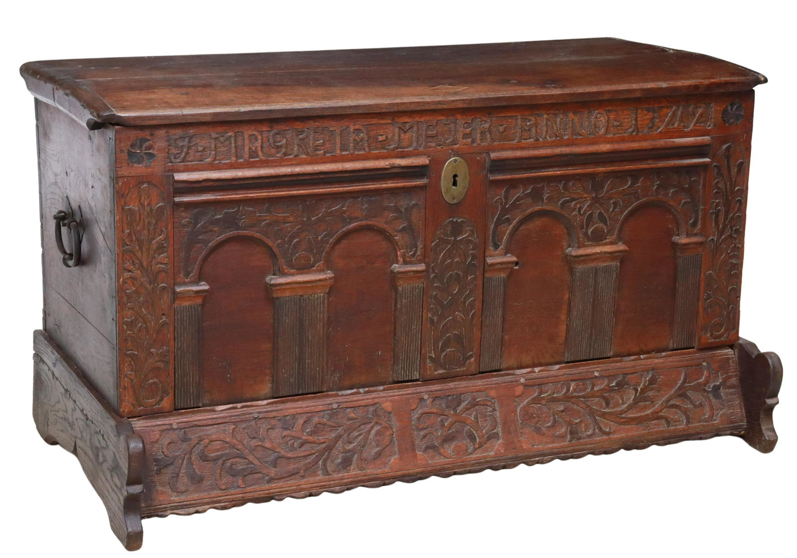 GERMAN CARVED OAK DOWRY/ STORAGE CHEST, 18TH C.: German oak dowry/ storage chest, 18th c., front carved with inscription "F. Magreta Mejer Anno 1742", foliate and arcaded front, hinged lid opening to storage interior, with iron side handles, rising 