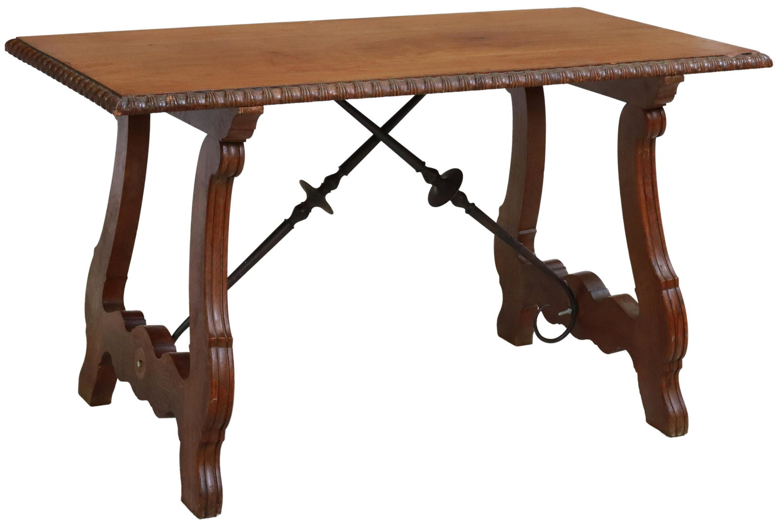 SPANISH BAROQUE STYLE OAK TABLE, 19TH C.: Spanish Baroque style oak table, 19th c., having carved border, rising on reeded ox yoke supports, joined with iron cross stretcher, approx 27.5"h, 47.5"l, 25.25"w Start Price: $200.00