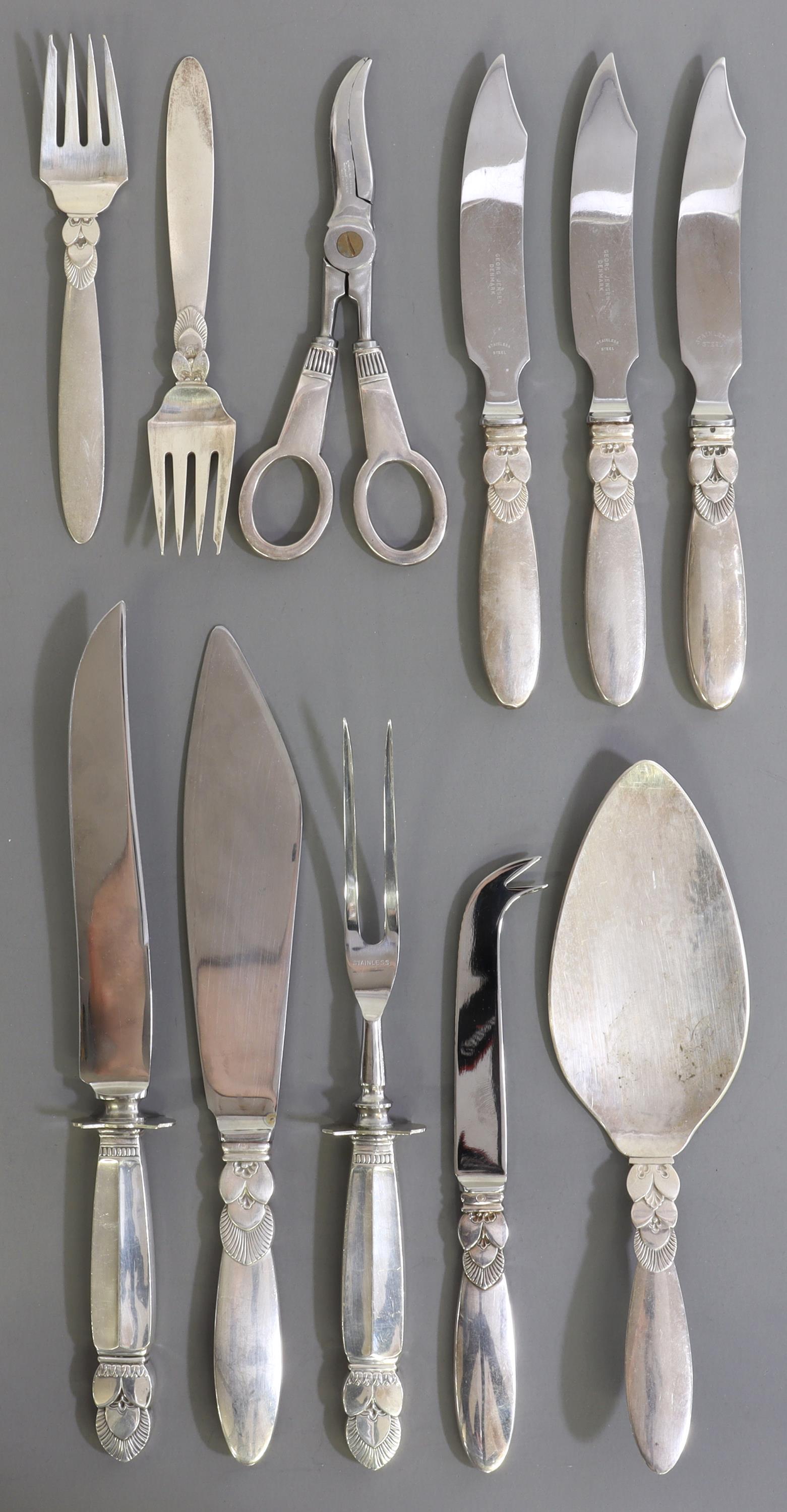 11) DANISH GEORG JENSEN 'CACTUS' STERLING FLATWARE: (lot of 11) Danish modern sterling silver flatware, Georg Jensen (1866-1935), in the "Cactus" pattern, including: (2) salad forks, 6.25"l, (3) hollow handle cheese knives, 8"l, (1) hollow handle bar k