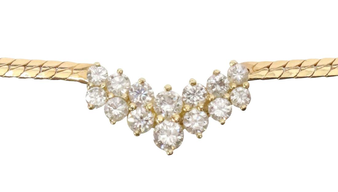 ESTATE 14KT GOLD & DIAMOND COLLAR NECKLACE: Estate 14kt yellow gold necklace, central pendant with fourteen diamonds, on a flat chain, box clasp hallmarked 14K, back of pendant hallmarked RE (?) 585, approx 16.5"l, 8.9 grams (inclusive of all m