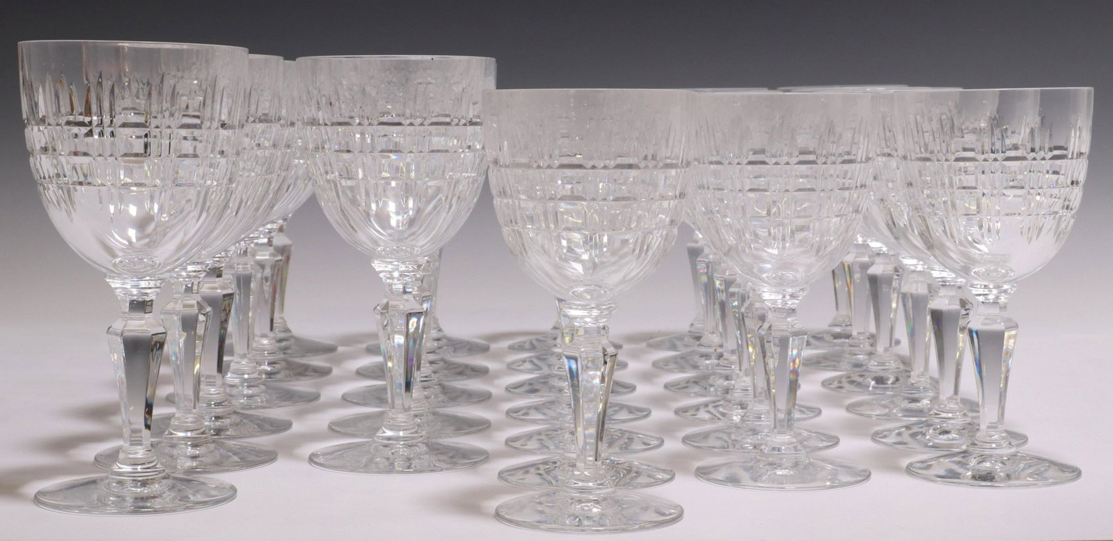 (30) FRENCH BACCARAT 'TURIN' CRYSTAL STEMWARE: (lot of 30) French cut crystal stemware, Baccarat, in the "Turin" pattern, bowl with cut vertical and box design, on a tapered stem, including: (11) water goblets, approx 6 5/8"h, 3.25"diam, (19) Clar