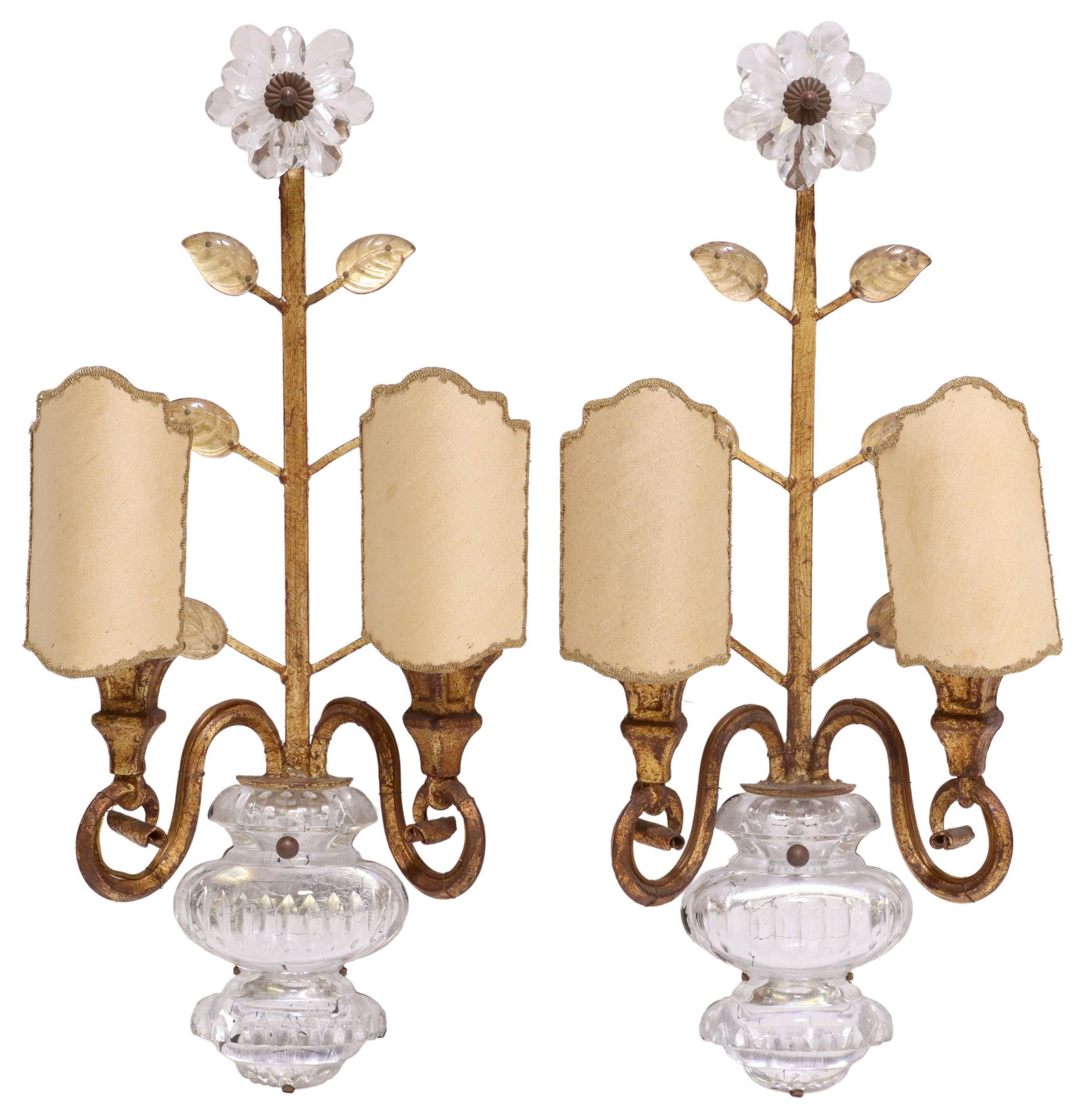 (2) MANNER OF MAISON BAGUES CRYSTAL WALL SCONCES: (pair) French gilt metal and crystal wall sconces, in the manner of Maison Bagues, in the form of a single flower stem, rising from a crystal urn, scrolling arms, issuing two lights, accompanied by re